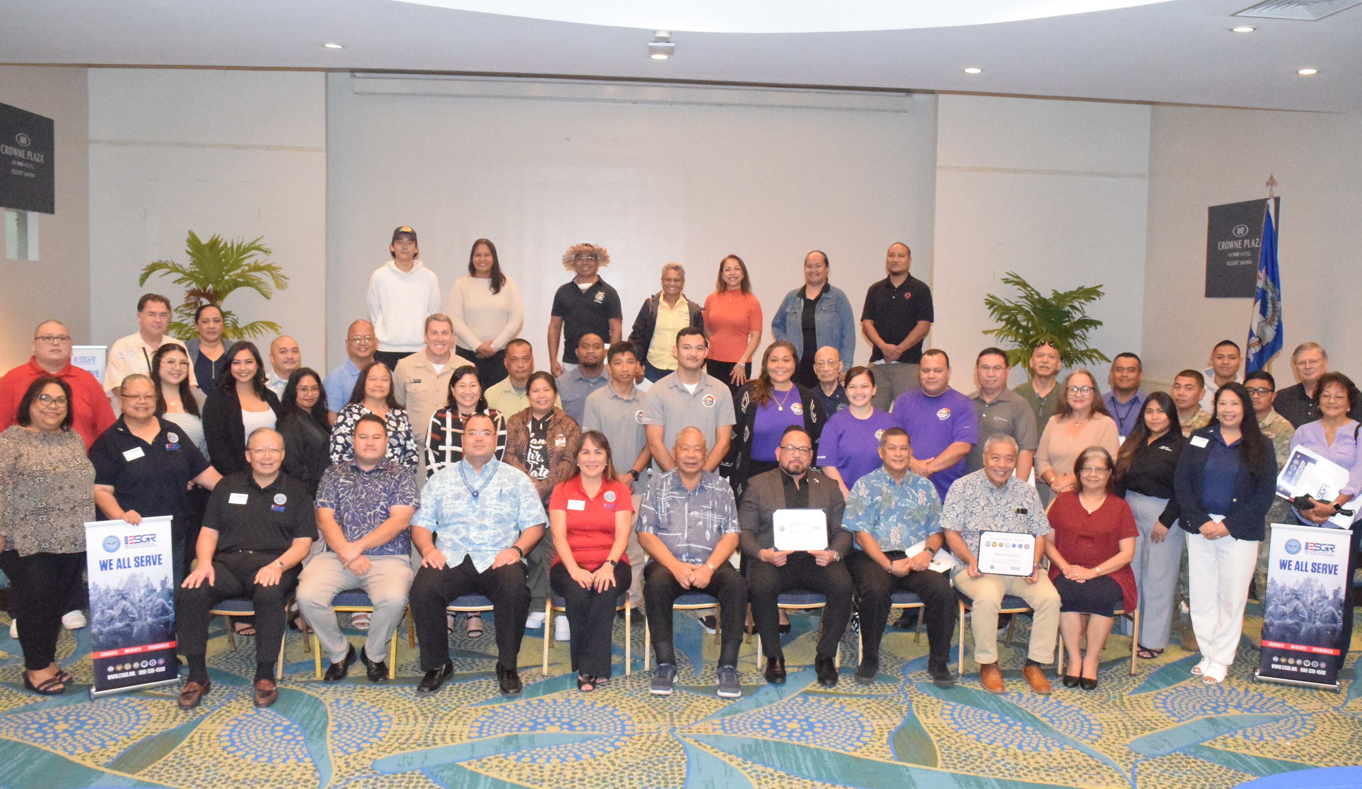 Department of Corrections Commissioner Anthony C. Torres, Special Assistant to the Governor for Military Affairs Danny Aquino, and First Hawaiian Bank Vice President and Branch Manager Vickie Izuka pose for a photo with Lt. Gov. David M. Apatang, Speaker Edmund S. Villagomez and the Guam-CNMI Employer Support of the Guard and Reserve State Committee officials during Lunch with the Boss at the Crowne Plaza Resort's Hibiscus Hall on Wednesday.