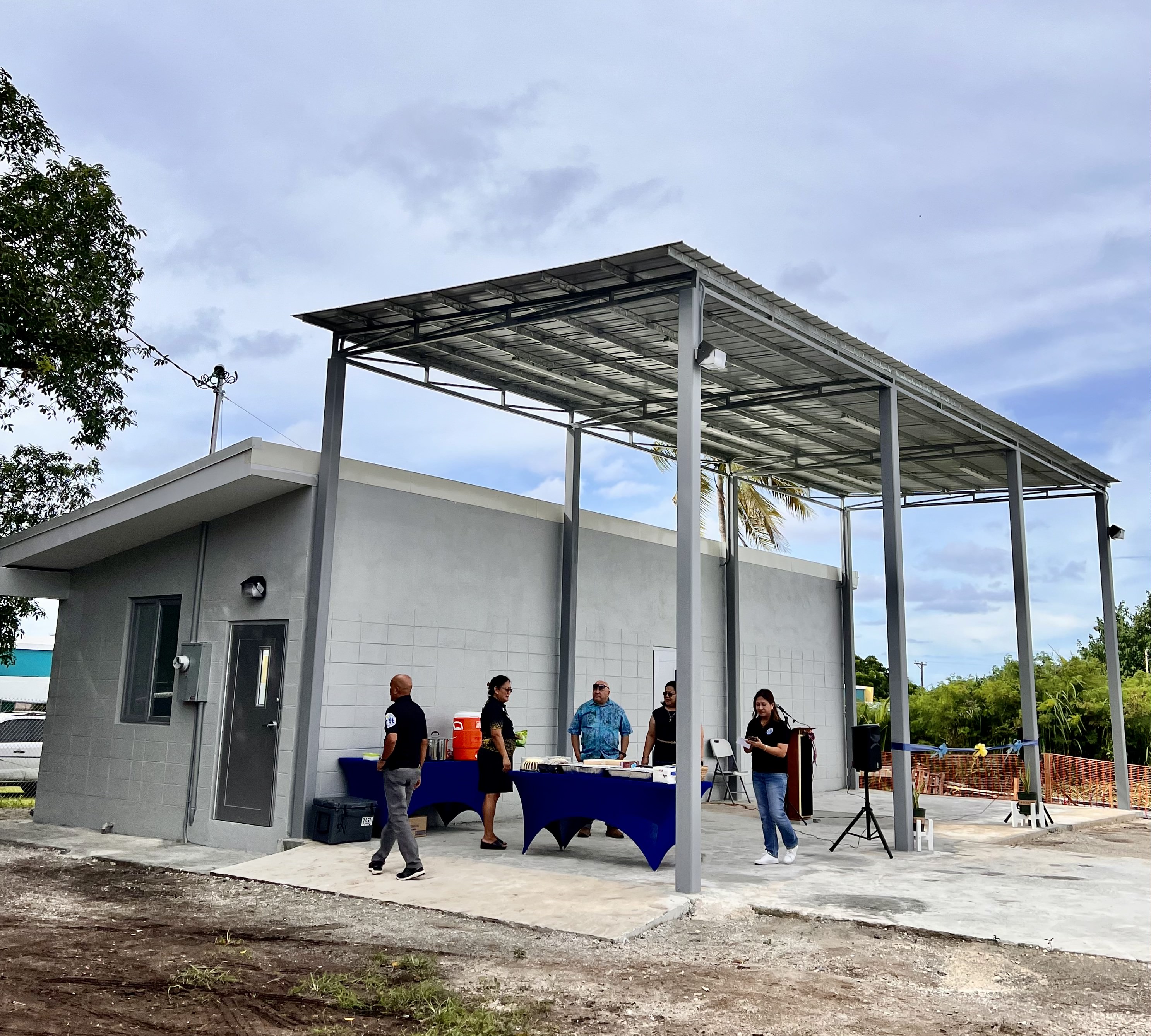 Commissioner of Education Dr. Camacho and Rota school principals Annette Calvo and Daisy Quitugua inspect the new facility.