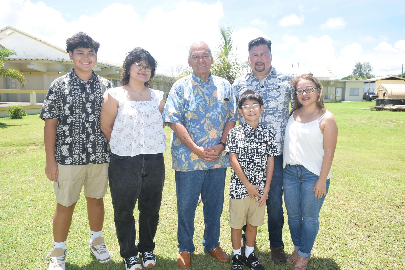 U.S. Congress candidate Rep. Edwin Propst, second right, with his son, Logan, daughter Kiana, son Devin, wife Daisy and U.S. Congressman  Gregorio Kilili Camacho Sablan, center.