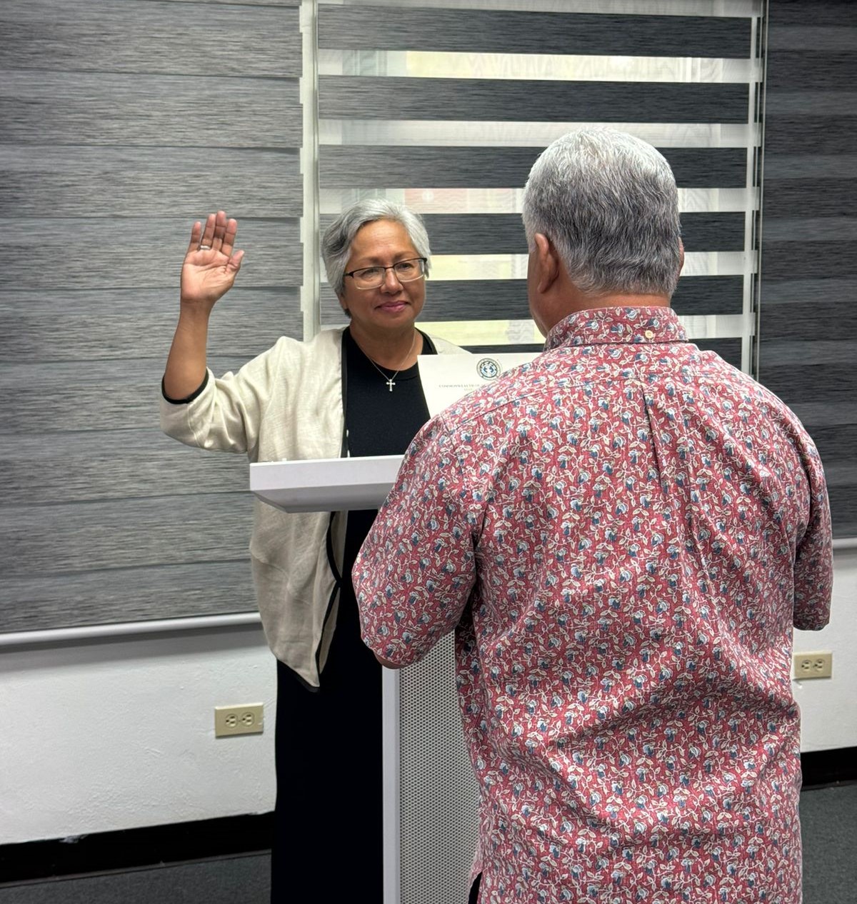 Gov. Arnold I. Palacios swears in Vicky I. Benavente of Benavente & Associates to the Marianas Visitors Authority board of directors on Aug. 20, 2024, at the Office of the Governor on Capital Hill, Saipan.  Benavente was also elected board secretary at the MVA board meeting on Aug. 21, 2024.