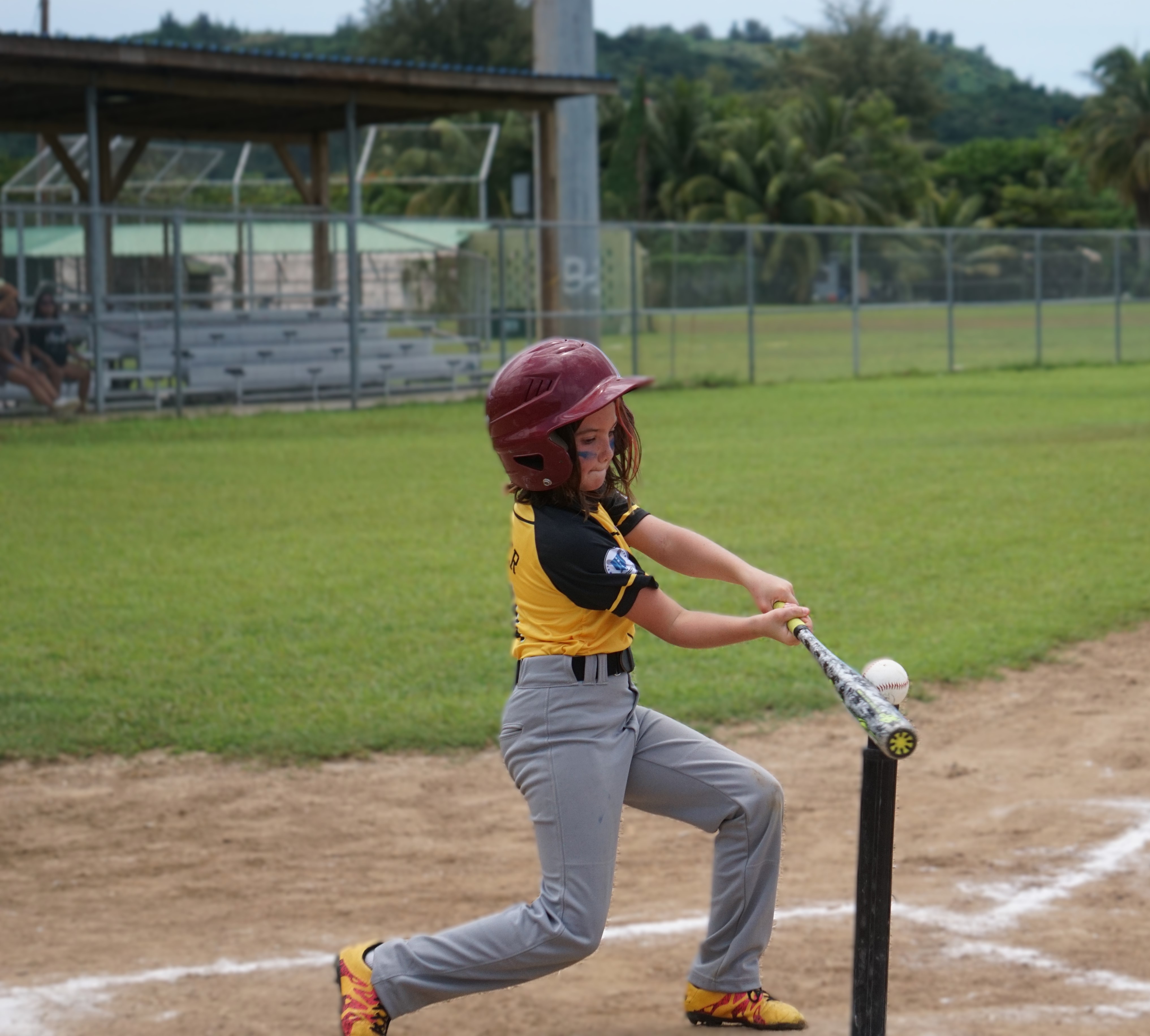 One of the Pirates swings and hits during a game against the Blue Jays 2 in the NMI Softball Association's inaugural T-Ball League at the Francisco "Tan Ko" Palacios baseball field.