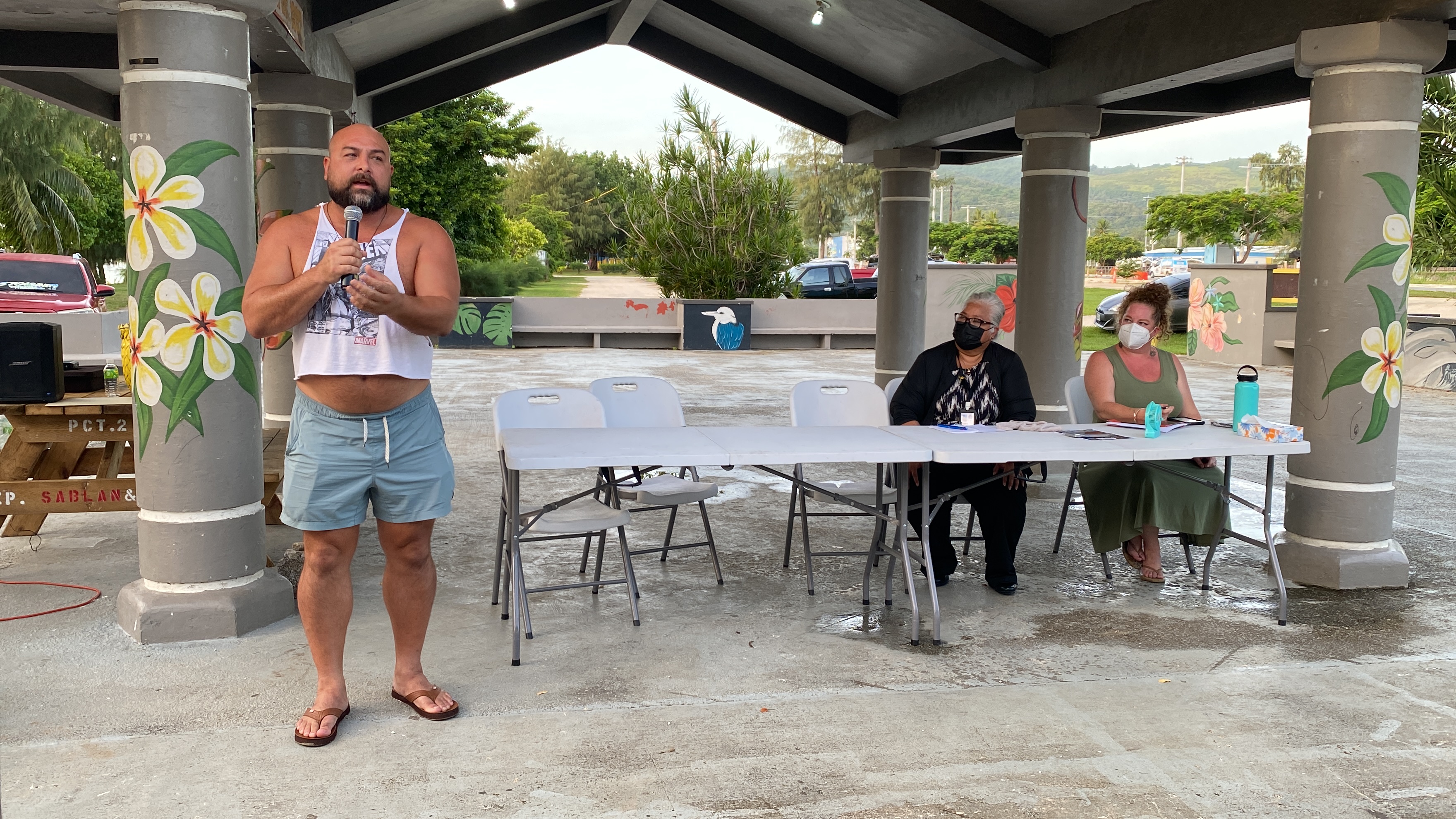 Roberto Santos, left, opposes the proposed cultural events center.