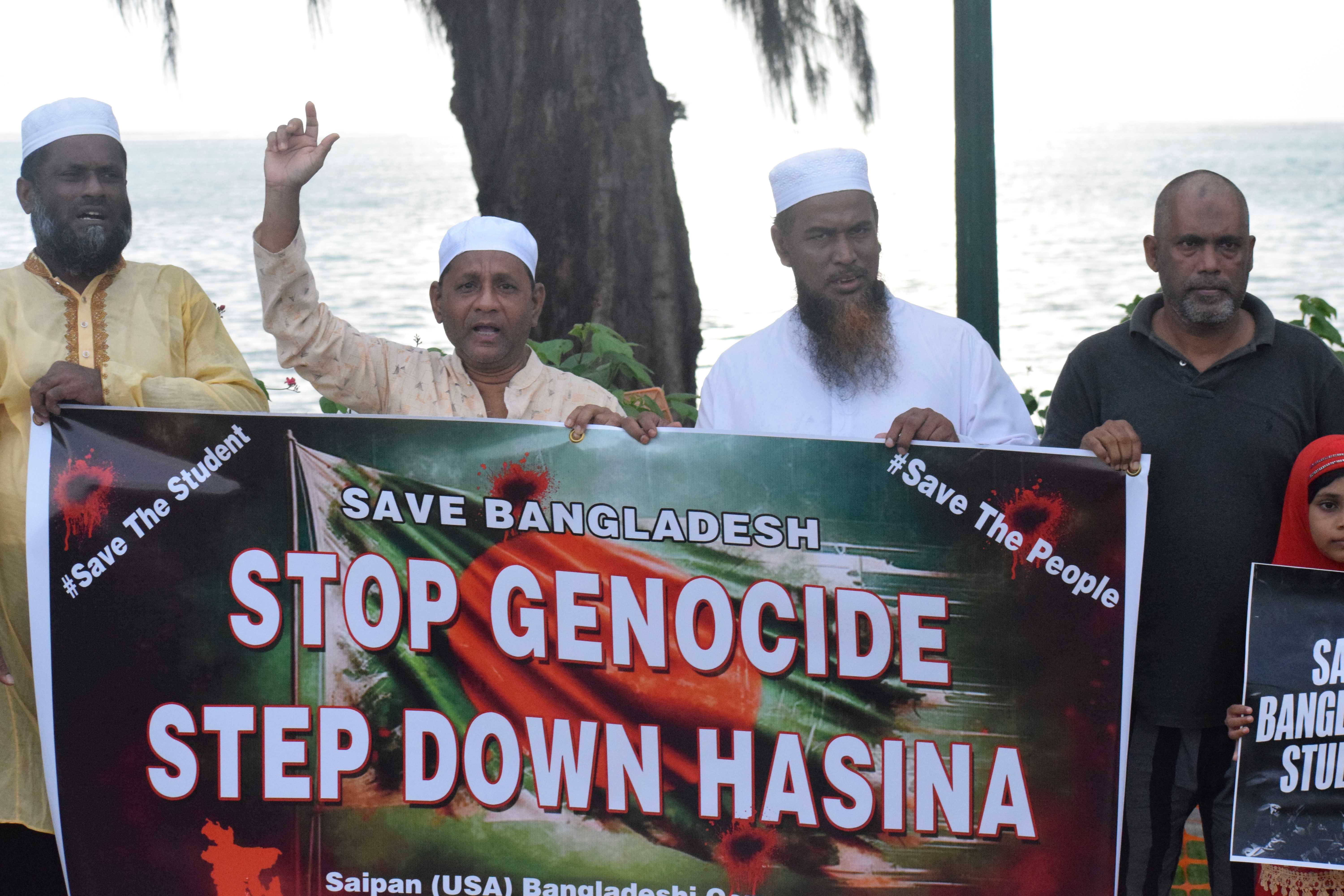 Members of the Bangladesh community stage a protest at the Atkins Kroll intersection in San Jose on Sunday.