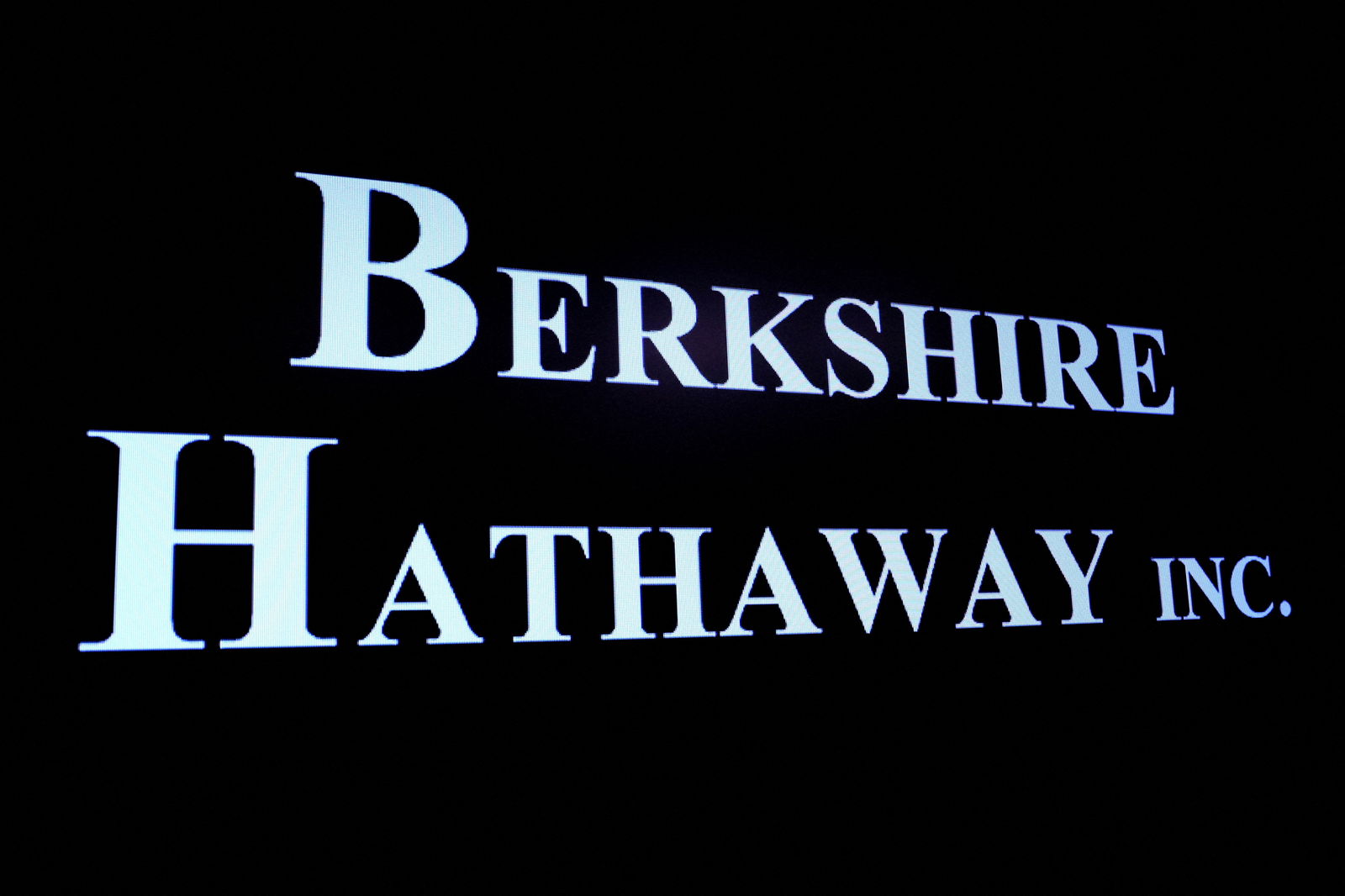 Berkshire Hathaway logo is displayed on a screen on the floor of the New York Stock Exchange in New York City, May 10, 2023.