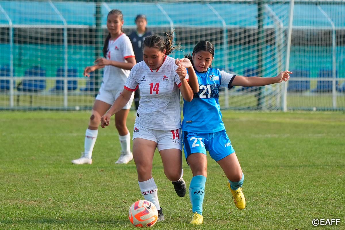 The NMI's Rhodalyn Zandueta battles for the possession against a Mongolian player during an EAFF U15 Women's Championship match at the Dalian Football Youth Training Center in China on Sunday.