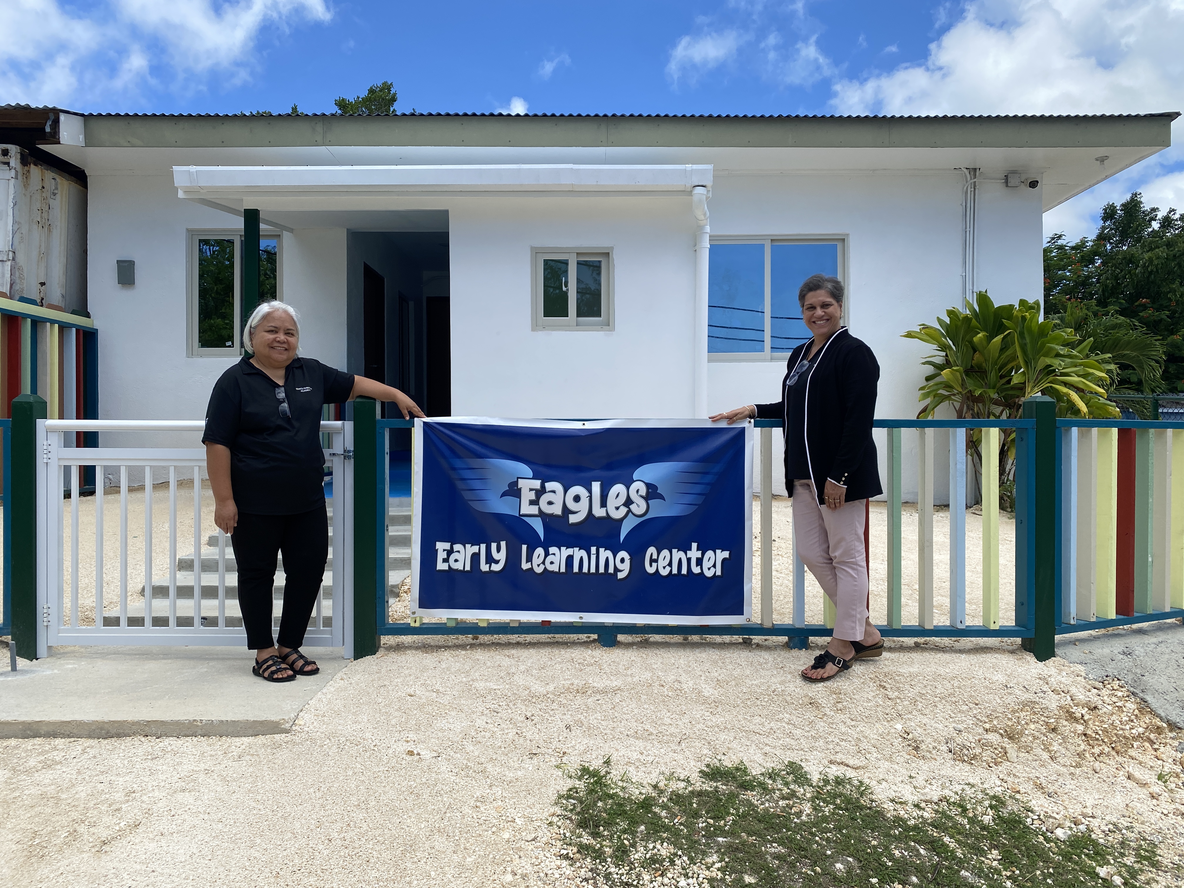 Rose Talibong, Grace Christian Academy business administrator, left, and Beth Nunez, school principal, pose outside the classroom where GCA will soon offer daycare services.