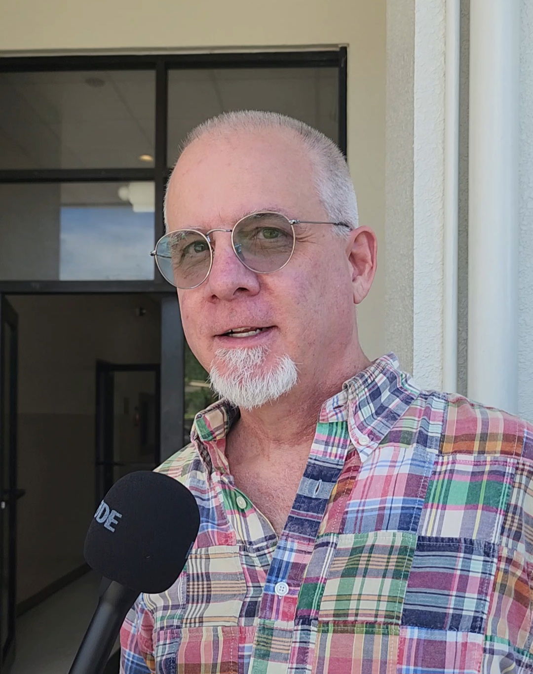 Attorney Mark Scoggins speaks to reporters.