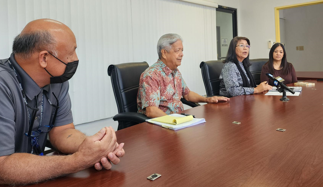From left, Department of Public Lands-Compliance Division Director Gregory Deleon Guerrero, special advisor David Sablan, DPL Secretary Teresita A. Santos, and DPL-Real Estate Division Director Boni Royal meet with reporters on Wednesday morning in the DPL conference room.