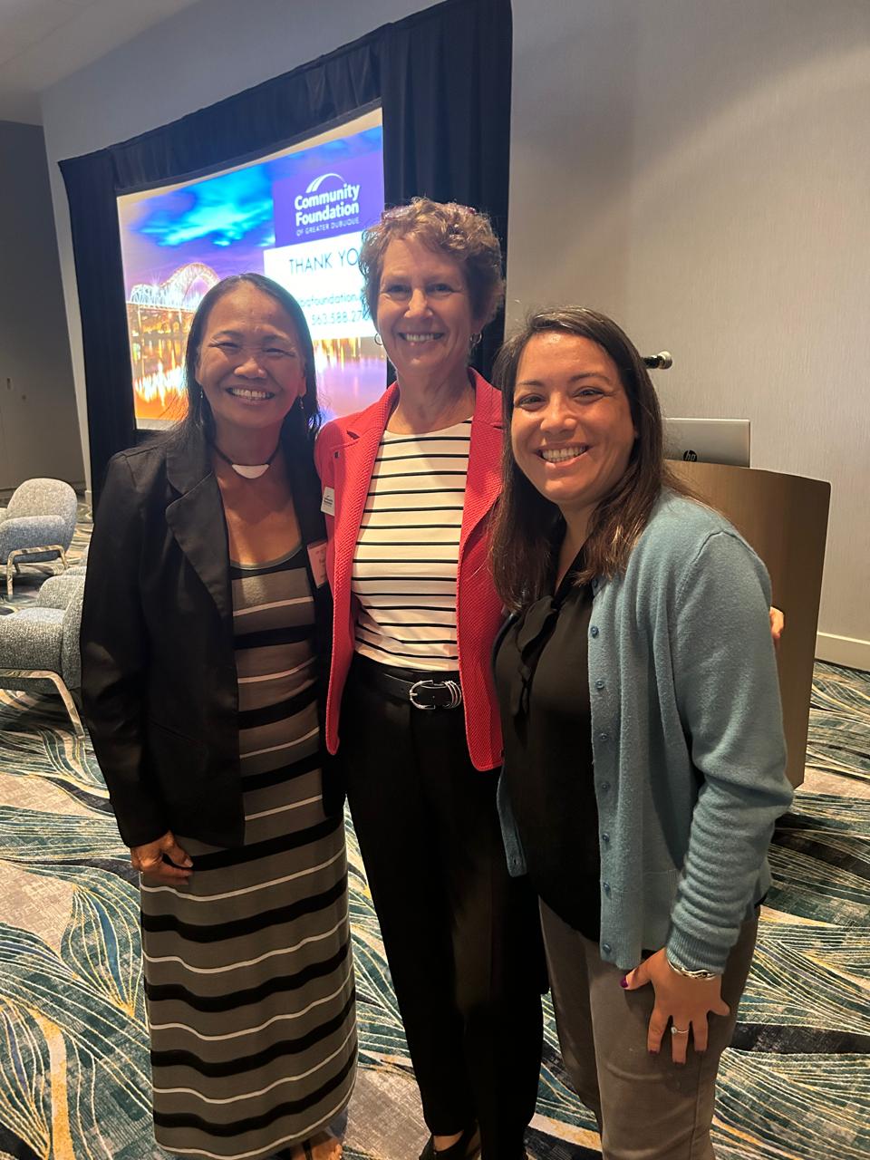 Frances Sablan, left, executive director for MANGO, poses with other regional leaders.