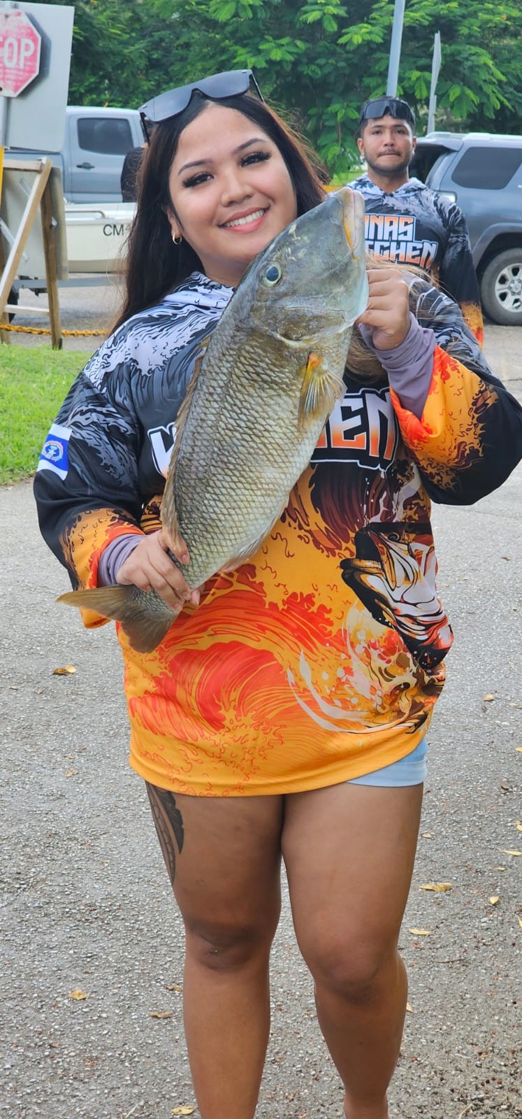 An angler of Inaka poses with an 8.25-pound mafuti they caught during the I Sanhalom Laguna Anglers Association’s 6th Annual Mafuti Derby on Saturday.
