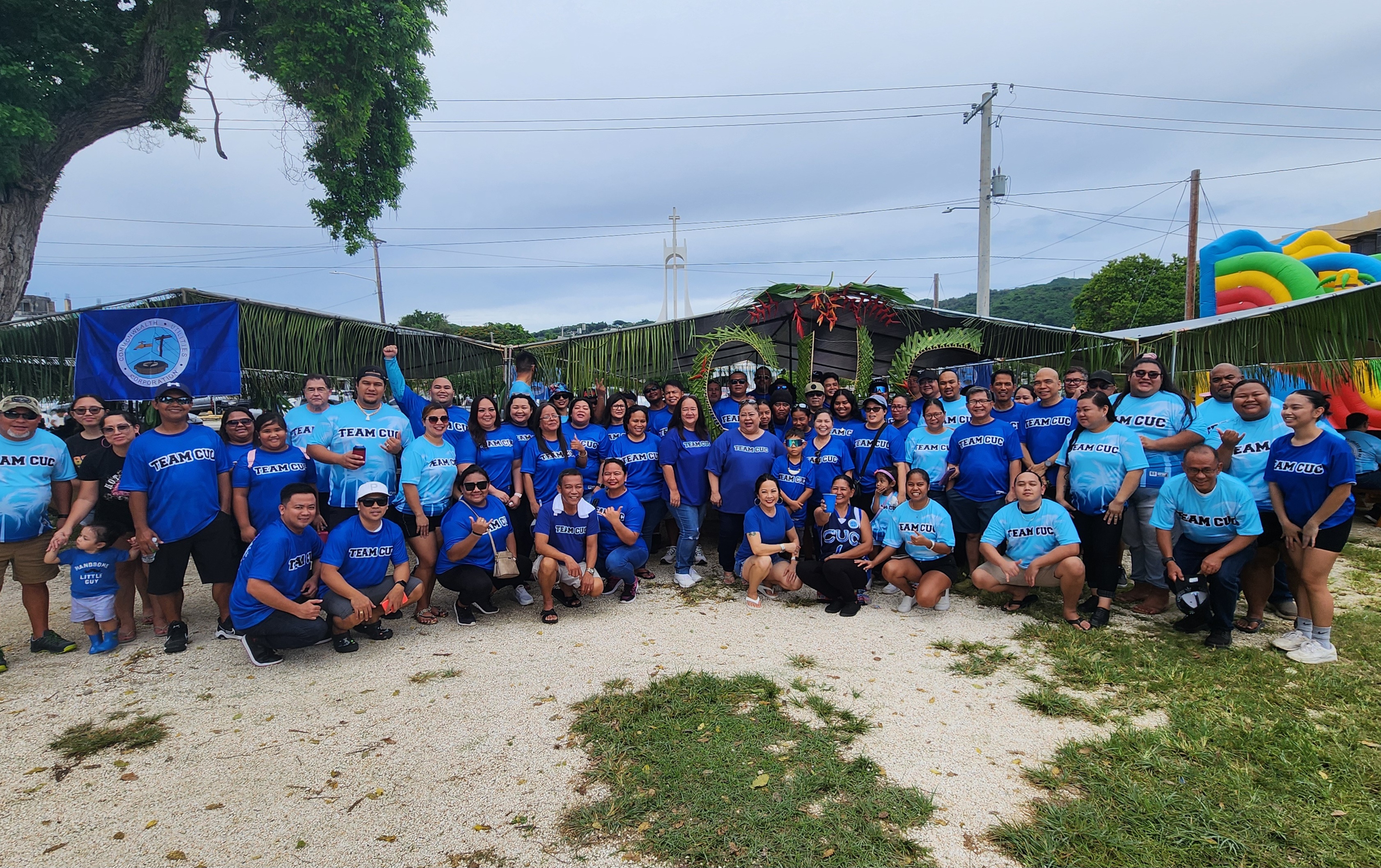 Commonwealth Utilities Corporation officials led by Executive Director Kevin Watson and the new chief financial officer, Betty Terlaje, pose for a photo with employees during the CNMI government’s Labor Day festivities on Sunday.