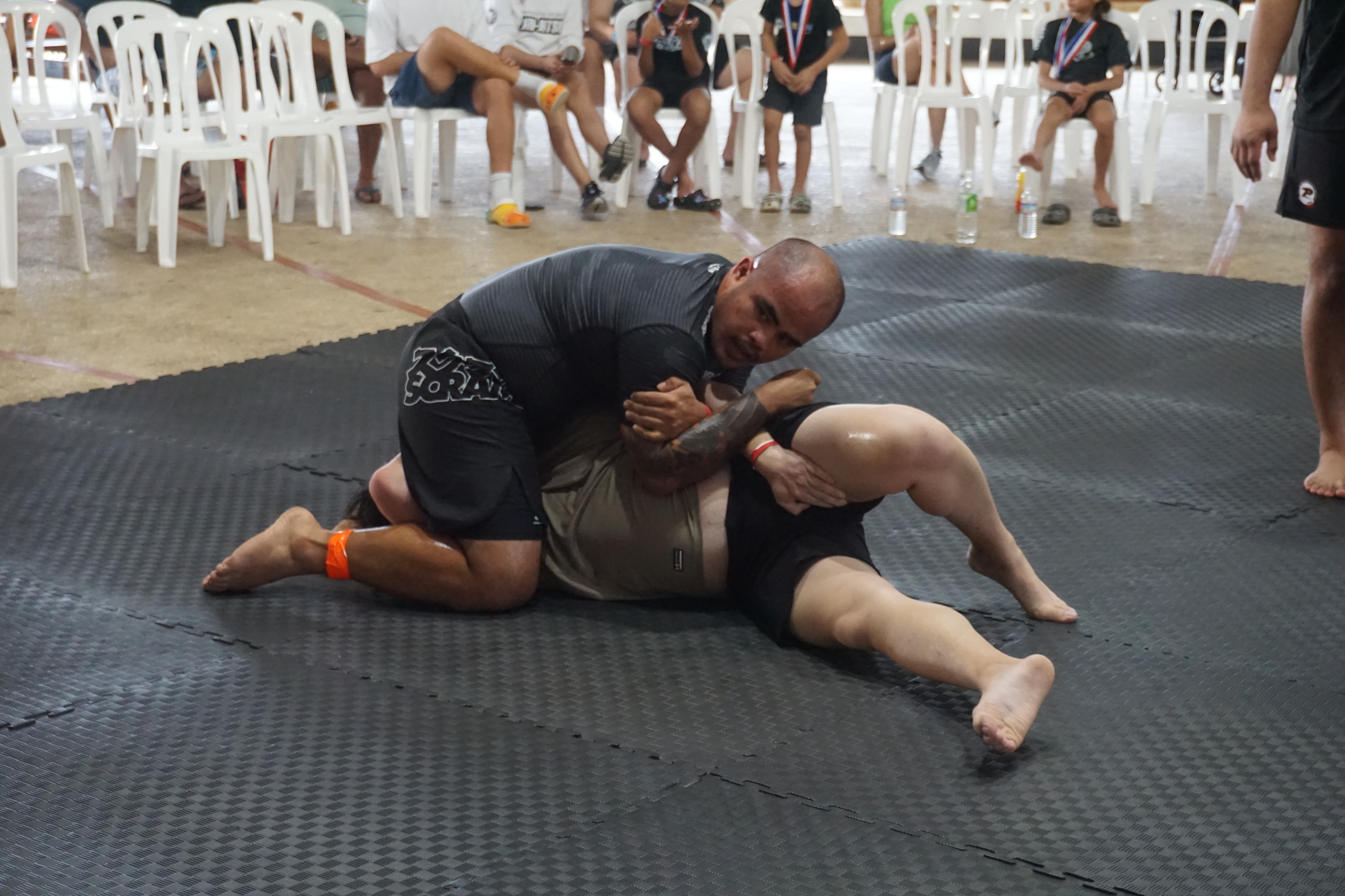 Moments after he threatened his opponent with an arm lock, Kier Agda punches his ticket to the medal round with a slick mounted triangle from north-south.
