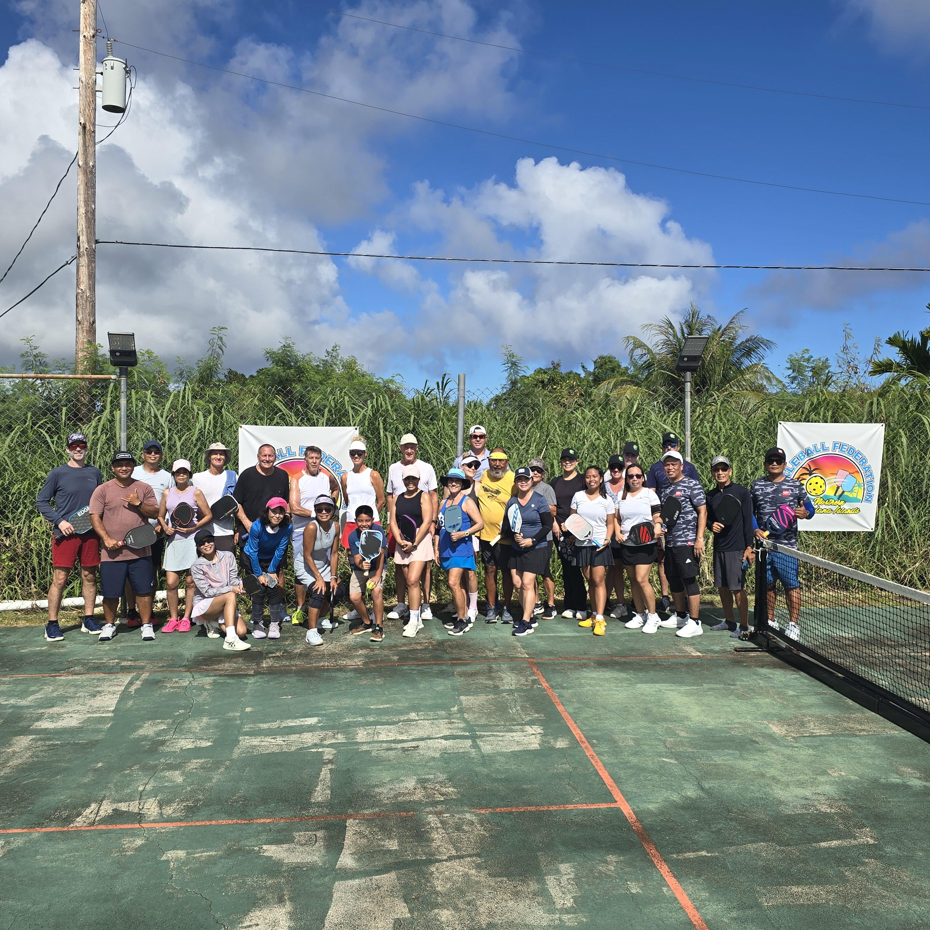 The participants of the Fun Fabulous Four Square and Fickle ball tournament pose for a photo.