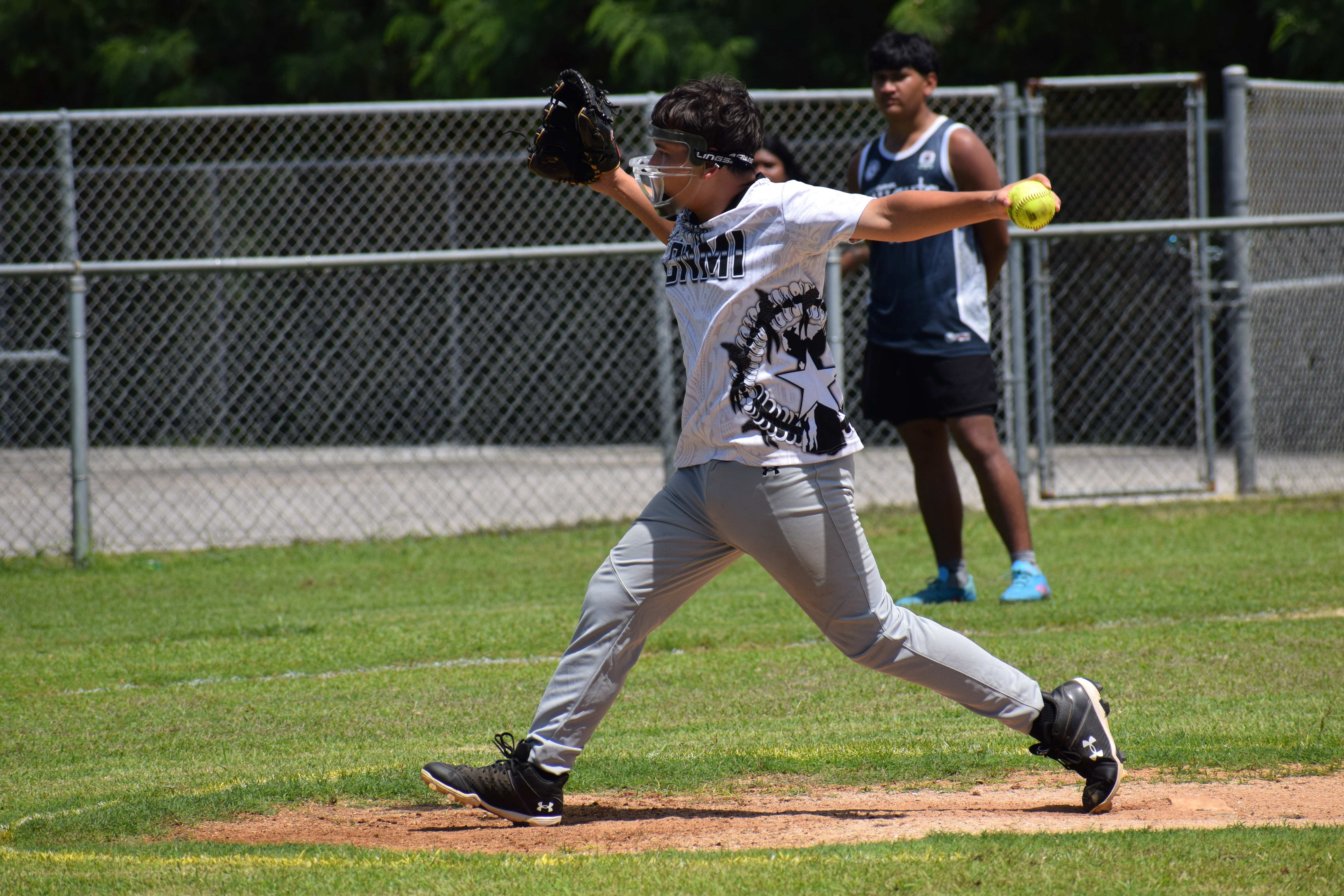Marianas High School pitcher Jesus Santos in action during a game of the Public School System’s Boys Fastpitch Softball Tournament at the Dandan Middle School Ballfield on Saturday.