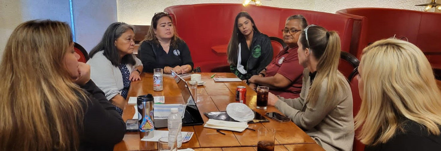 PSS-SPED State Director Donna Flores, left, and University of Guam’s CEDDERS June De Leon, 2nd left, listen during a meeting with community stakeholders, leaders and education advocates.