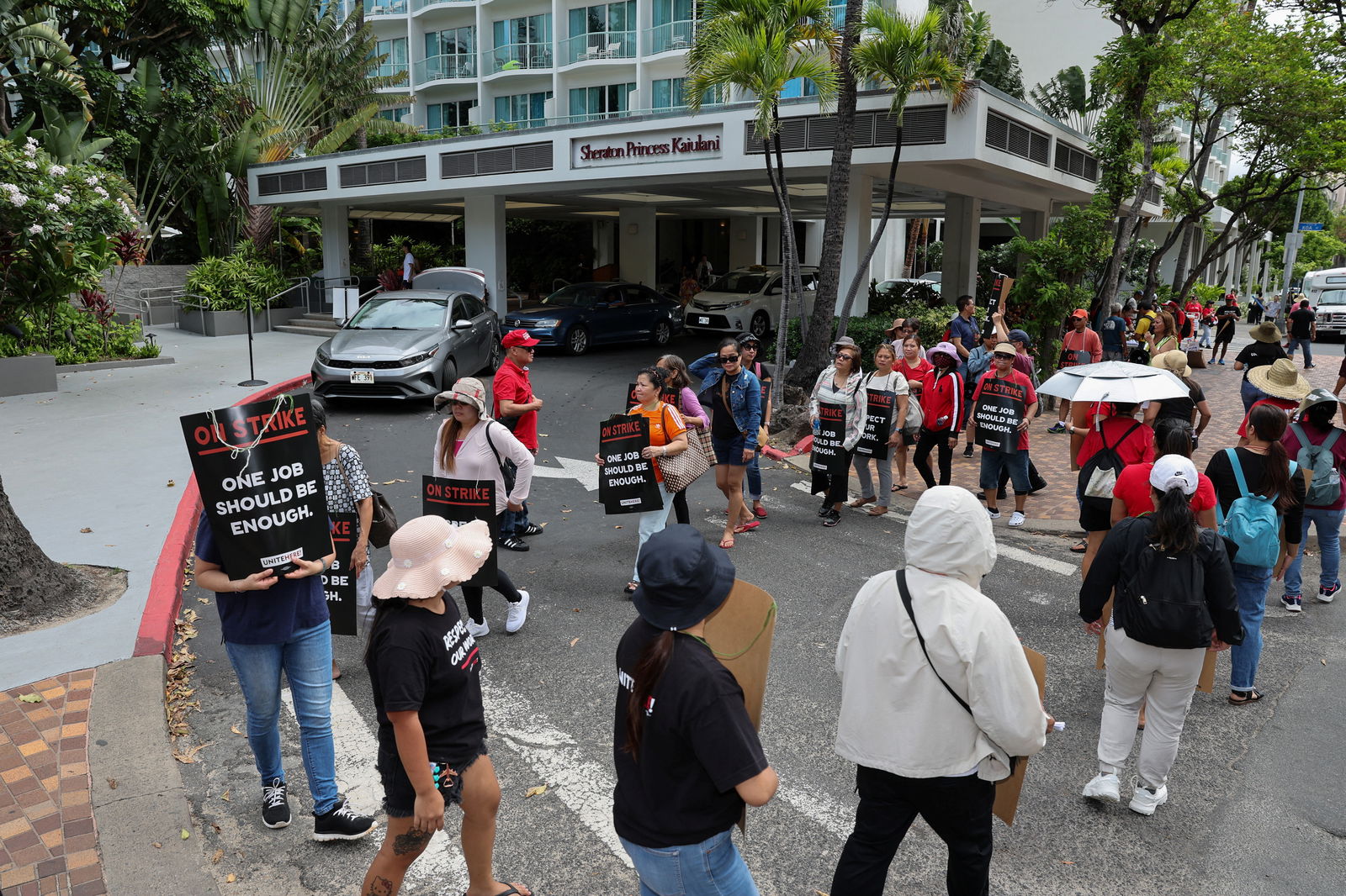 Hotel workers strike in Waikiki as some 10,000 U.S. hotel workers represented by the Unite Here union began a multi-day strike in several cities after contract talks with hotel operators Marriott International, Hilton Worldwide and Hyatt Hotels reached an impasse, in Honolulu, Hawaii, Sept. 1, 2024.