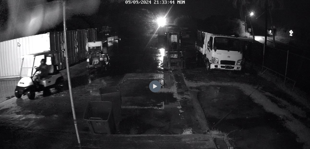 CCTV imagery captures the moment two men drive off with golf carts that belong to COP.