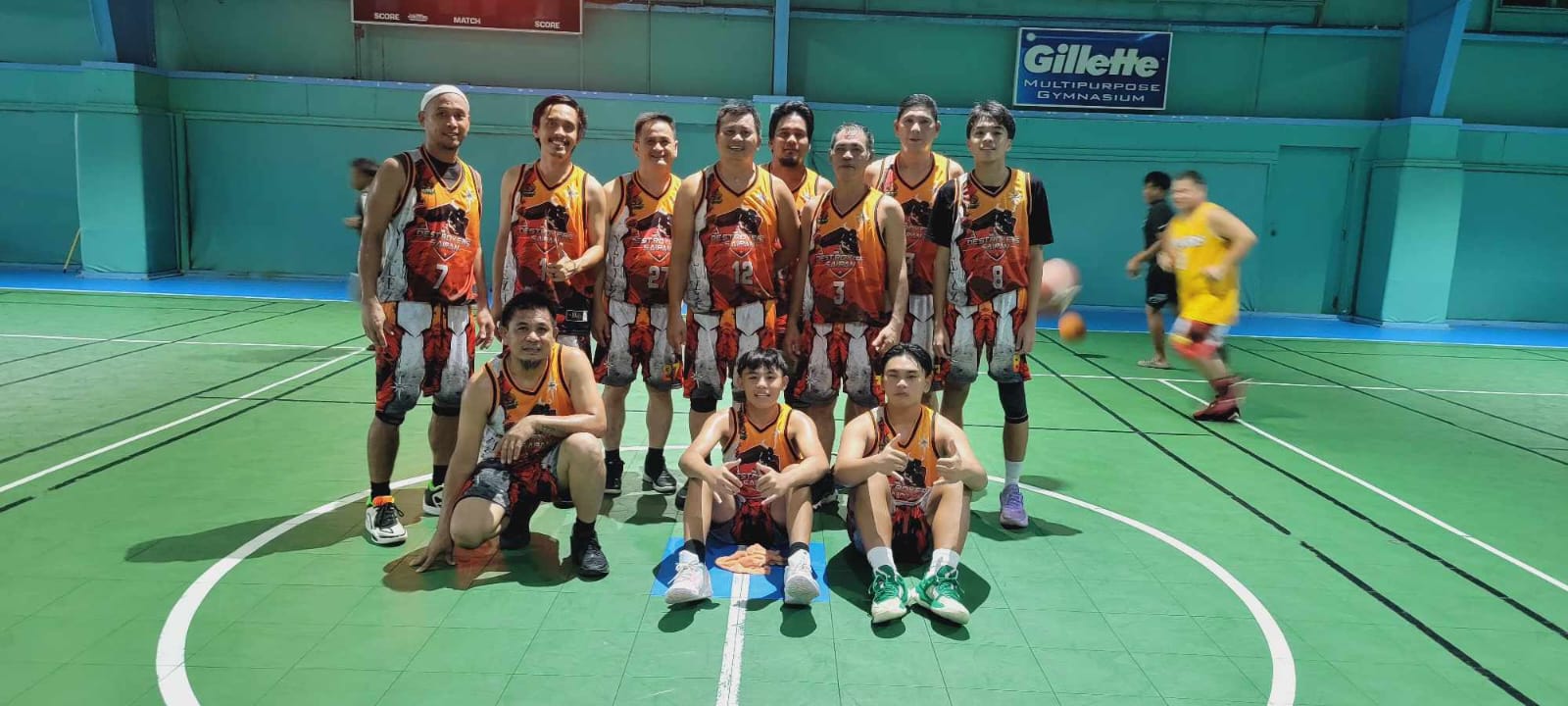 The Velleza players pose for a photo after a Destroyers Basketball Club Friendly Game at the Tan Siu Lin Sports Center on Tuesday.