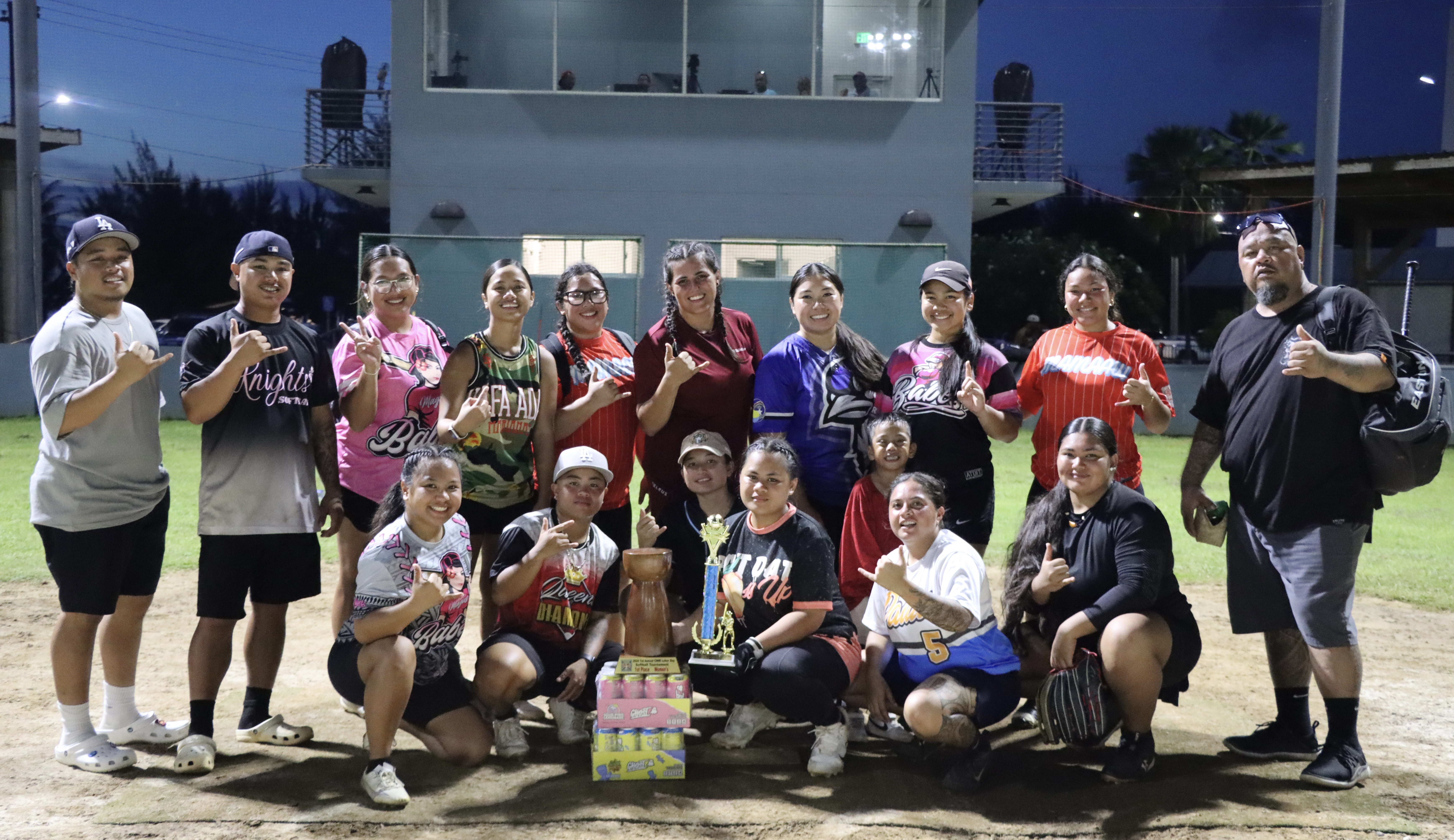 Sliding Dirty players pose for a group photo with the women's division championship trophy of the 1st CNMI Labor Day Tournament during the Labor Day weekend at the Francisco "Tan Ko" Palacios Baseball Field.