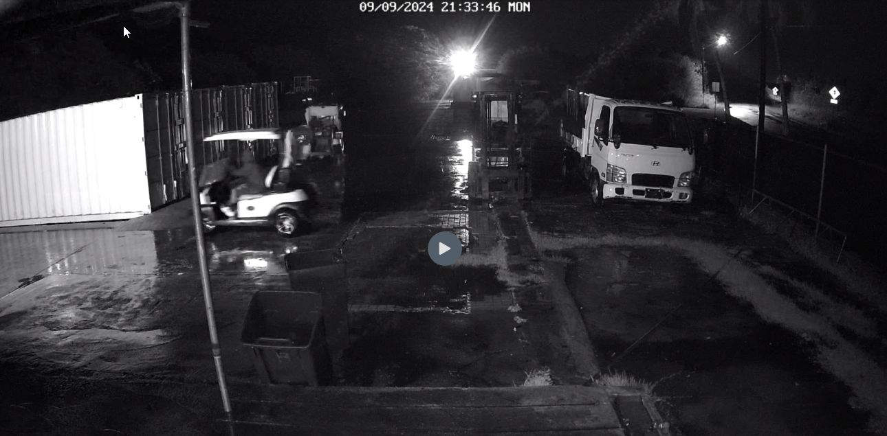 CCTV imagery captures the moment two men drive off with golf carts that belong to Coral Ocean Point.