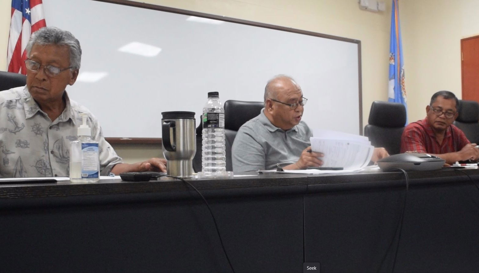 Commonwealth Casino Commission Chair Edward C. Deleon Guerrero, center, speaks as Vice Chair Ralph S. Demapan, right, and Commissioner Mario Taitano listen during CCC’s monthly regular meeting in Gualo Rai on Thursday.