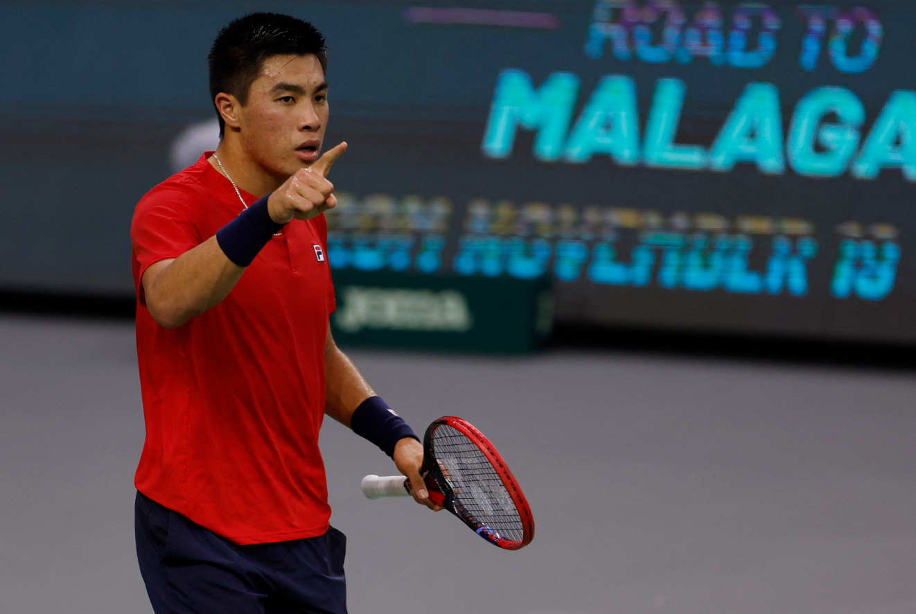 Brandon Nakashima of the U.S. celebrates winning his match against Slovakia's Jozef Kovalik in Group C of the Davis Cup at Hengqin International Tennis Center in Zhuhai, China, Sept. 13, 2024.