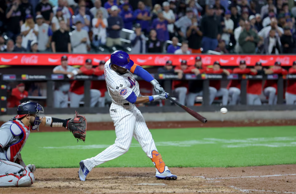 New York Mets right fielder Starling Marte (6) hits a tenth inning walkoff single against the Washington Nationals at Citi Field in New York City, Sept. 16, 2024.
