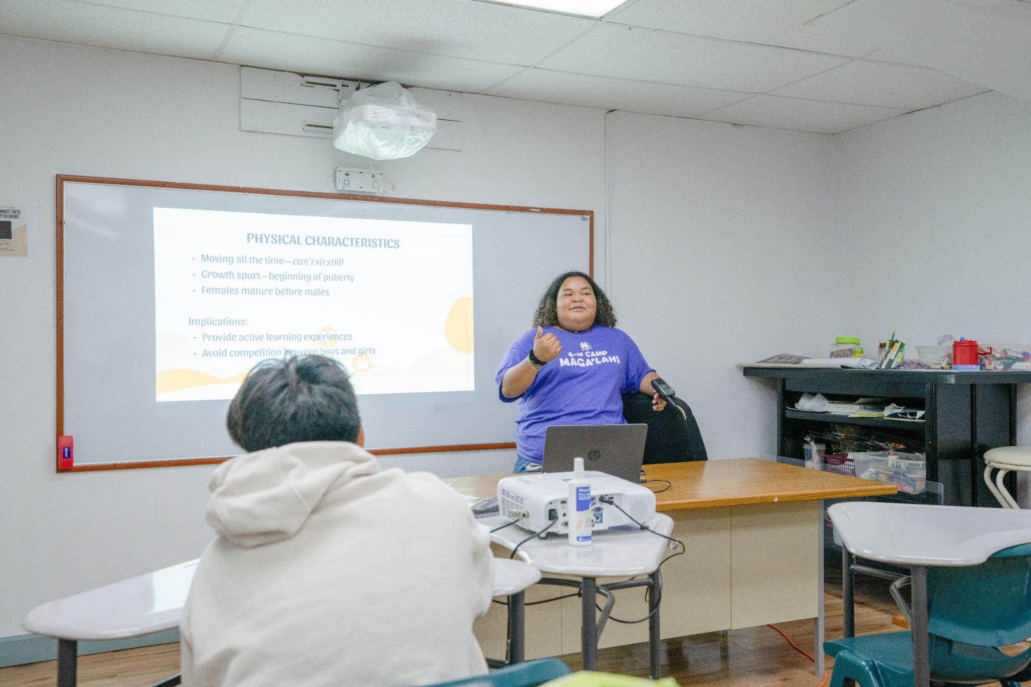 4-H Overall Lead Camp Counselor and Saipan Island Council member Anastacia Minor presents a module to fellow camp counselors.