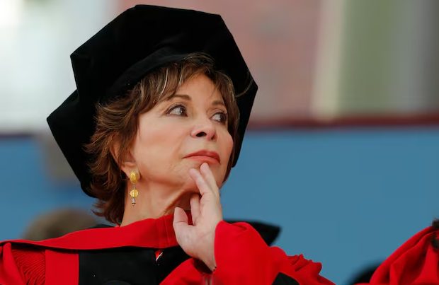 Author Isabel Allende sits onstage after receiving an honorary Doctor of Letters degree during the 363rd Commencement Exercises at Harvard University in Cambridge, Massachusetts, May 29, 2014.
