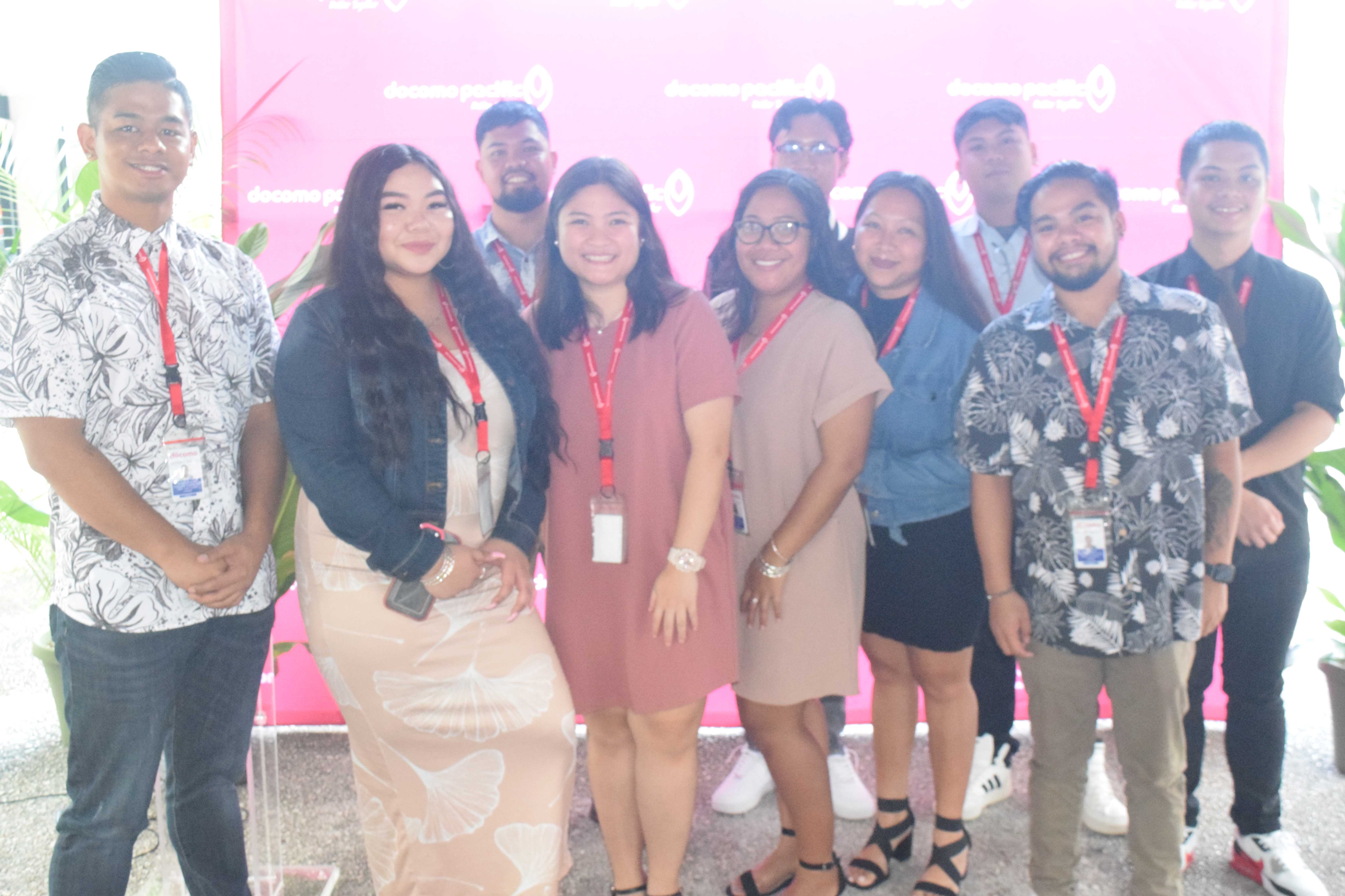 The Docomo Pacific call center agents pose for photo on Wednesday in Gualo Rai.