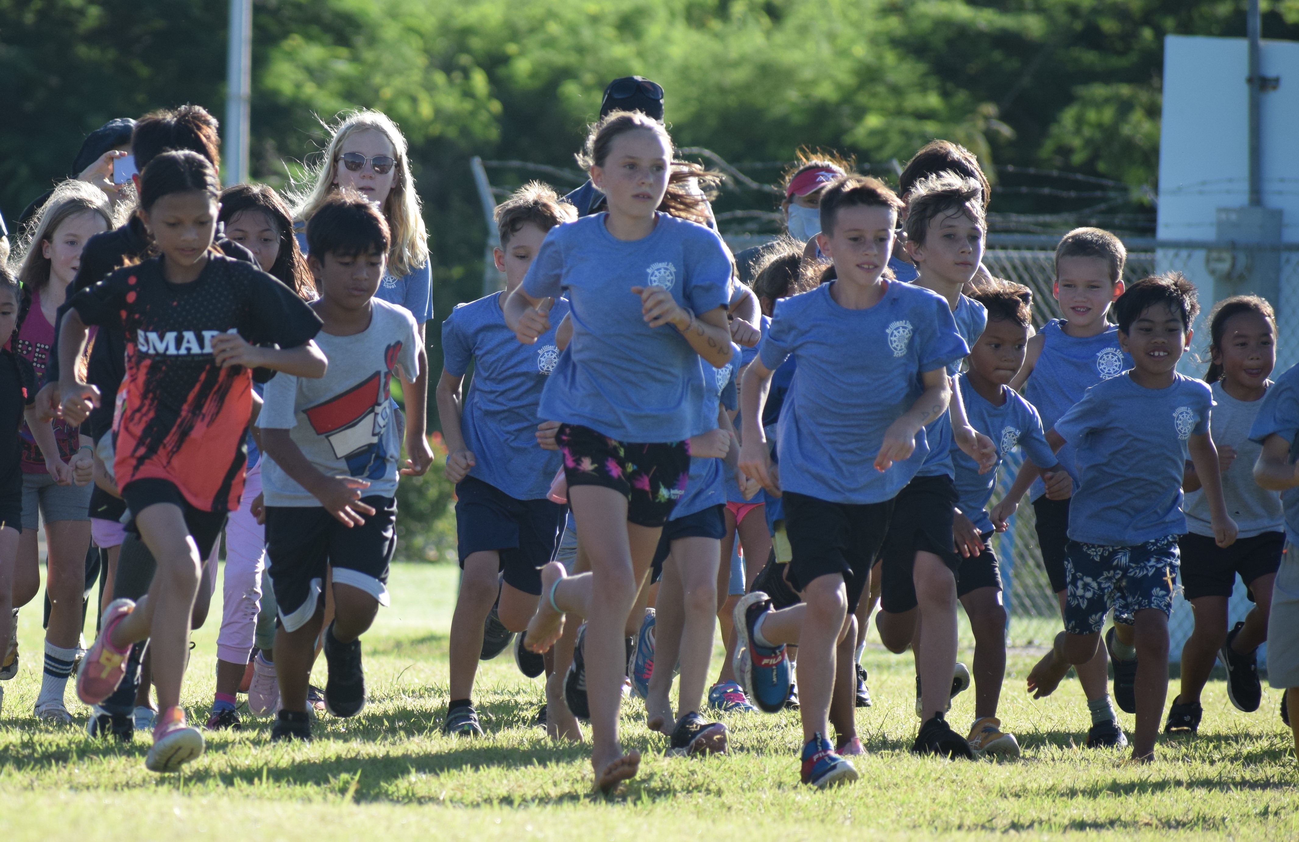 Elementary students vie for the one-mile run title.