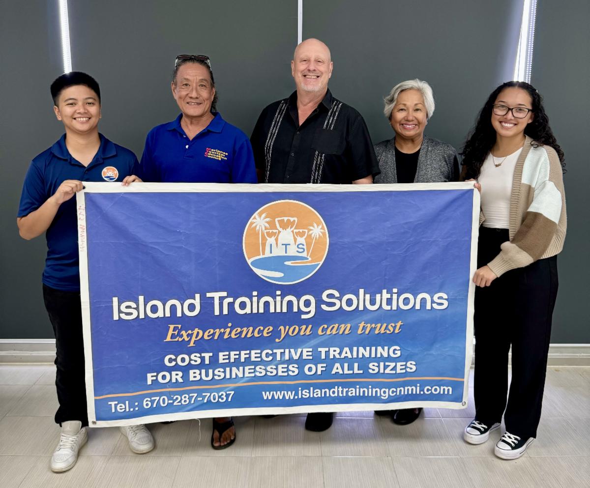 Island Training Solutions owner Jim Arenovski, center, donates a $5,000 hole-in-one prize on Sept. 23, 2024, for the Marianas Tourism Cup Golf Classic on Oct. 12, 2024, at LaoLao Bay Golf & Resort in Saipan. From left, ITS Program Facilitator Marielle Lim, MTEC Board Member Larry Lee, Arenovski, MTEC Chair Vicky Benavente, and ITS Program Coordinator ReavenJei Cru. Tournament registration forms and details are available at www.mymarianas.com/the-marianas-calendar/.
