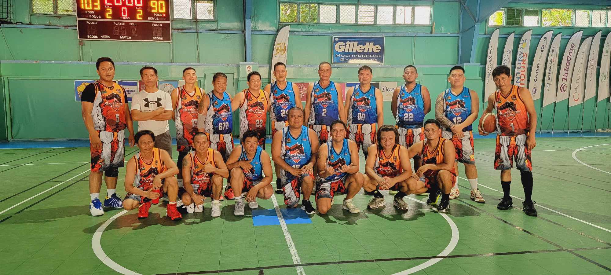 Savory Bistro Café and Sakalam players pose for a group photo after their opening game in season 2 of the Destroyers Basketball Club Friendly Games 2024 at the TSL Sports Complex on Sunday.