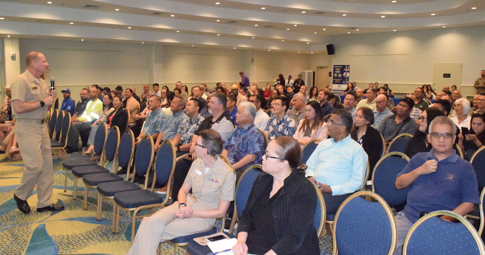 Joint Region Marianas Commander Adm. Brent DeVore speaks to members of the local business community.