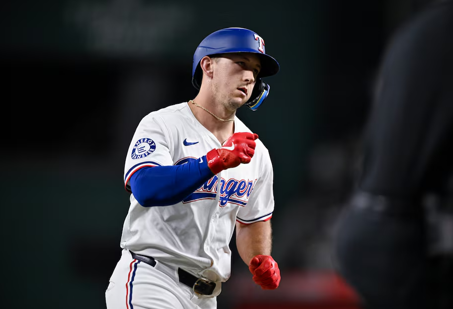 Texas Rangers left fielder Wyatt Langford (36) rounds the bases after he hits a two-run home run during the seventh inning against the New York Yankees at Globe Life Field in Arlington, Texas, Sept. 2, 2024.