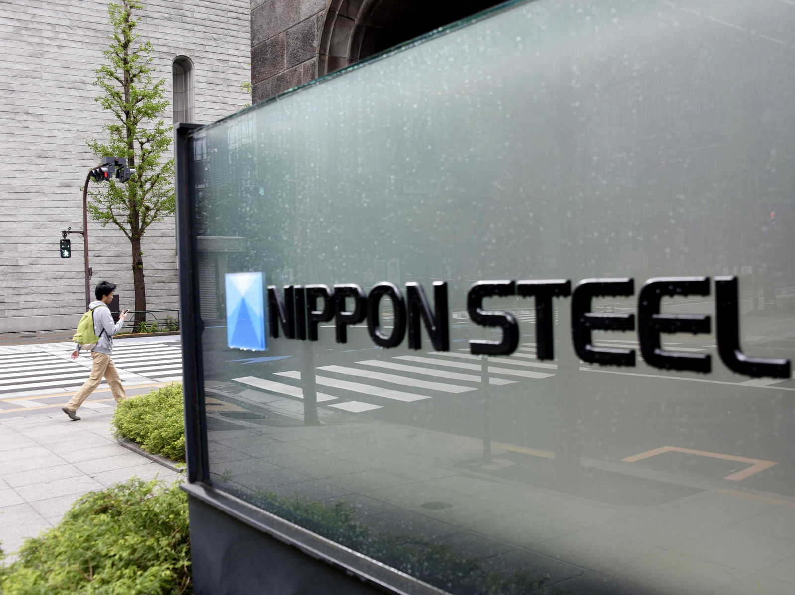 The logo of Nippon Steel Corporation is displayed at the company headquarters in Tokyo, Japan on May 1, 2019.