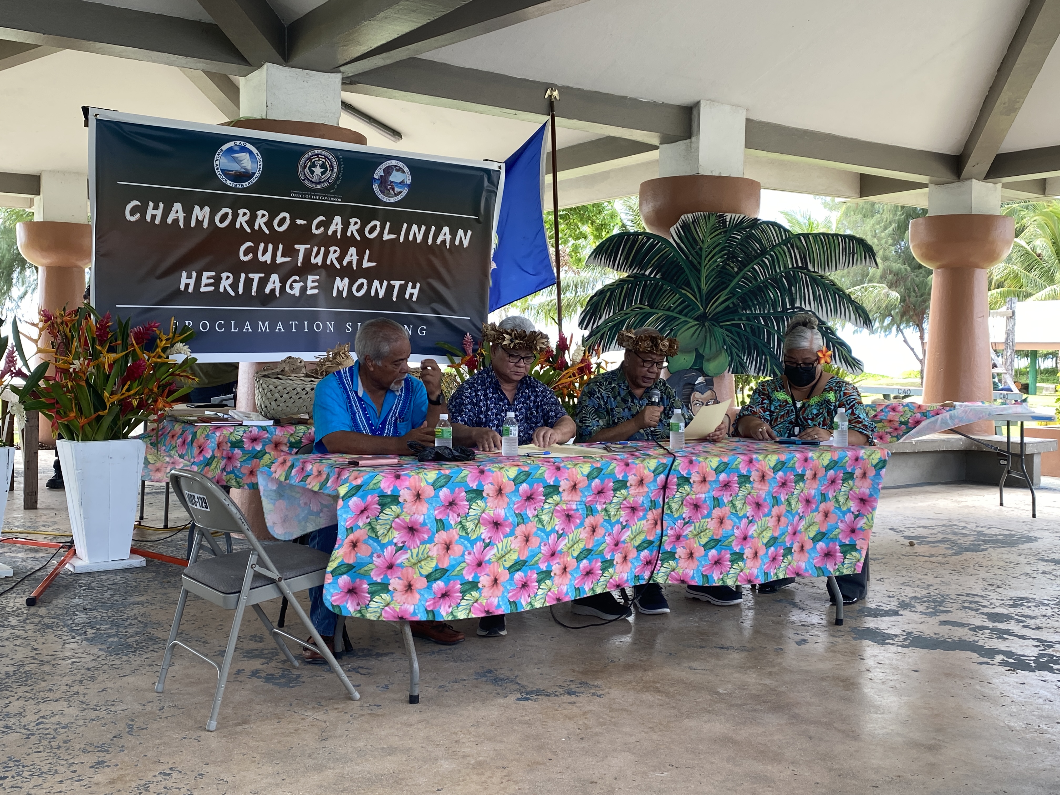 Gov. Arnold Palacios, 2nd left, and Lt. Gov. David M. Apatang, 2nd right, are joined by Carolinian Affairs Office Executive Assistant Felix Nogis, left, and Indigenous Affairs Office Resident Executive Luella Marciano, right, at the signing of a proclamation designating September as Chamorro-Carolinian Cultural Heritage Month.  