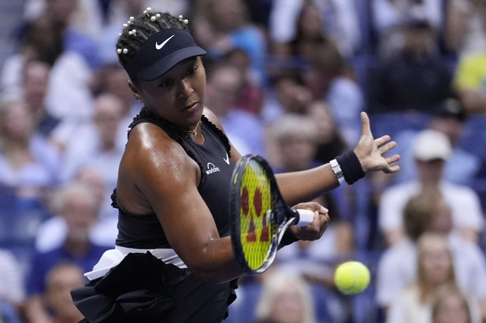 Naomi Osaka of Japan returns a shot to Karolina Muchova of the Czech Republic during a second round match of the U.S. Open tennis championships, Aug. 29, 2024, in New York.
