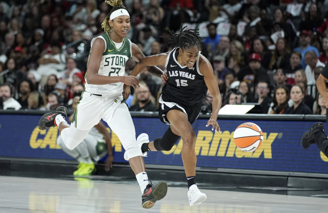 Las Vegas Aces guard Tiffany Hayes (15) steals the ball from Seattle Storm guard Jordan Horston (23) during the half in Game 2 of a WNBA first-round playoff game Tuesday, Sept. 24, 2024 in Last Vegas.