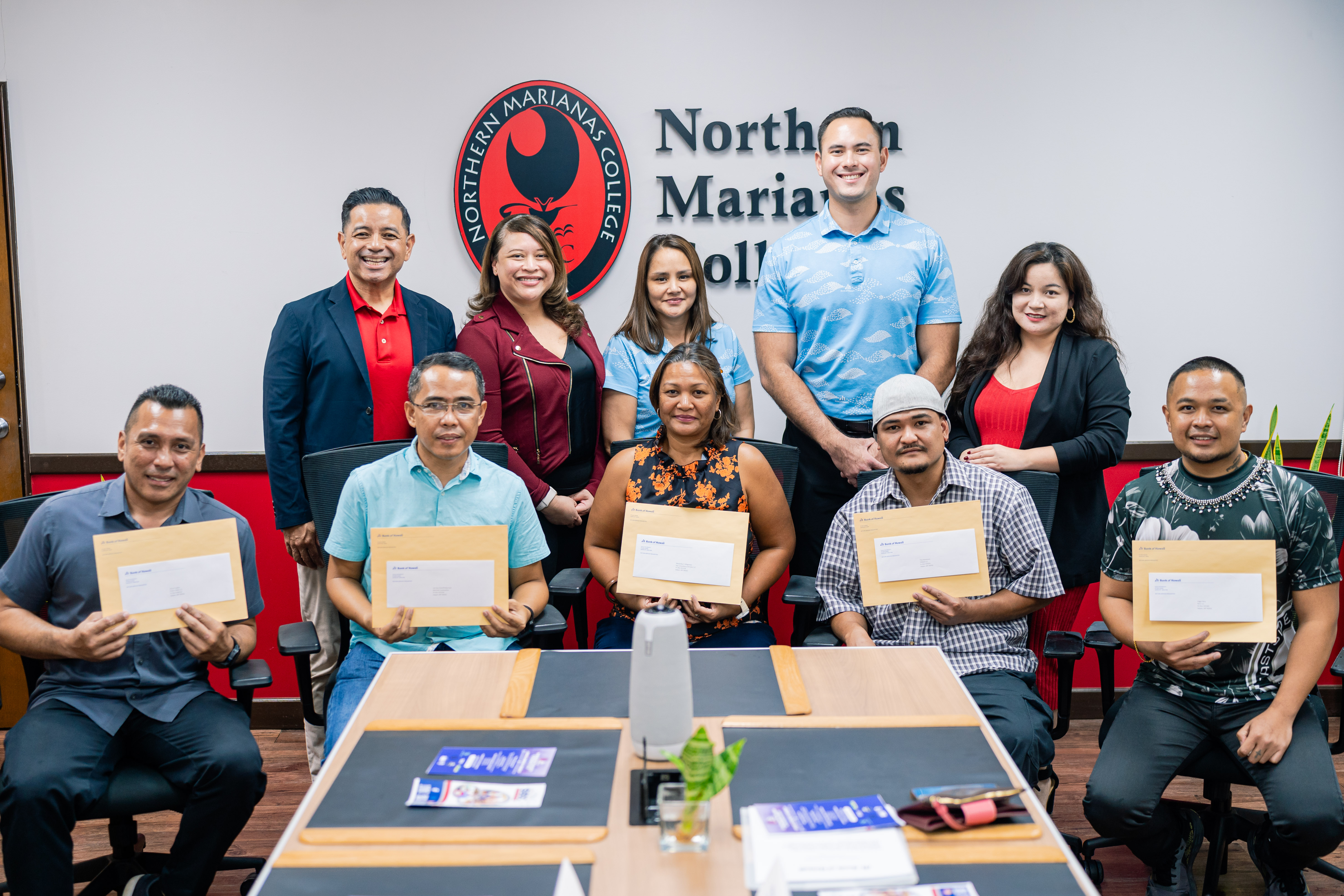 This year’s grant awardees pose for a photo with Bank of Hawaii, CNMI Small Business Development Center Network and Northern Marianas College officials.