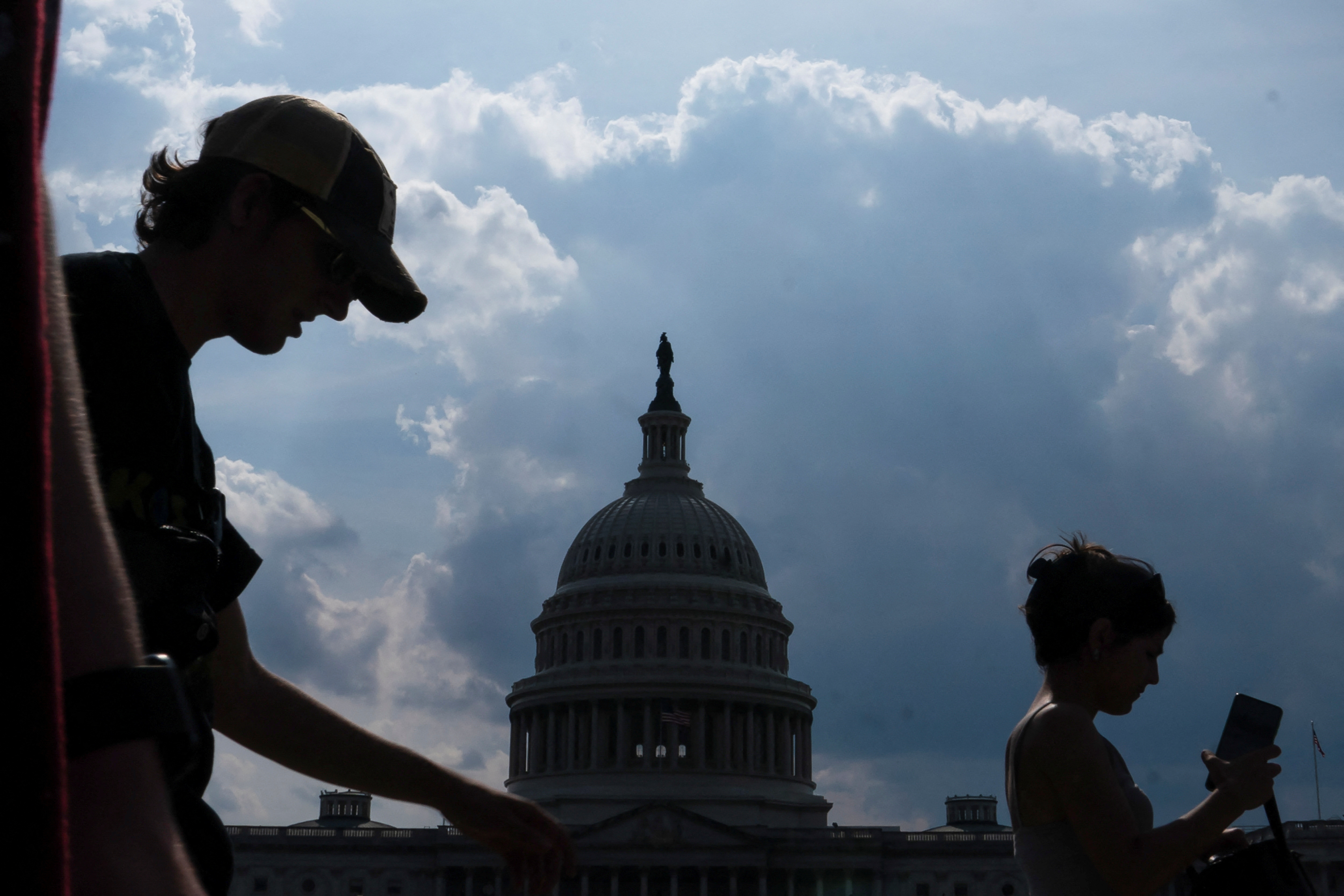 Visitors walk past the U.S. Capitol in Washington, D.C., June 4, 2024. R