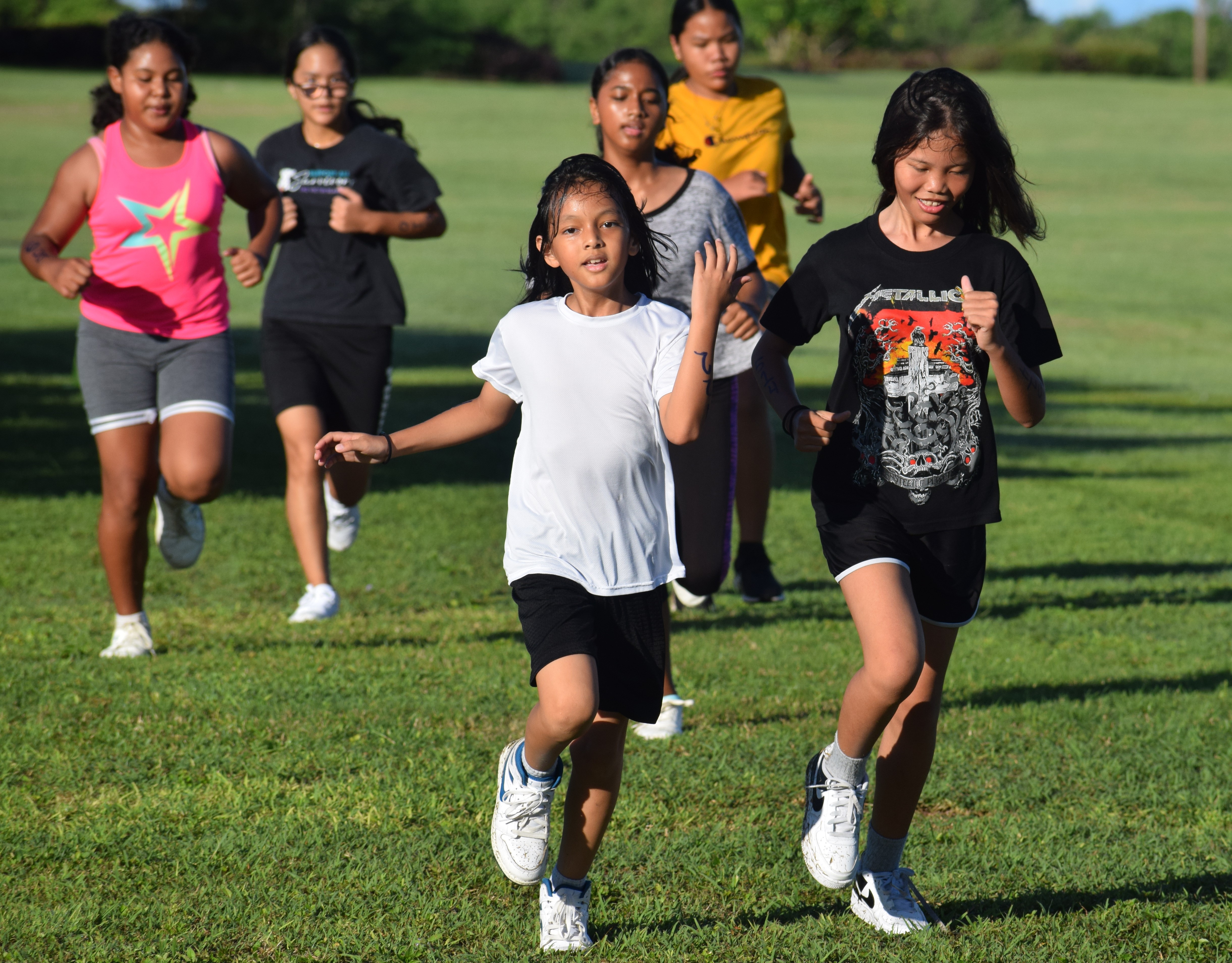 Middle school girls head to the finish line.