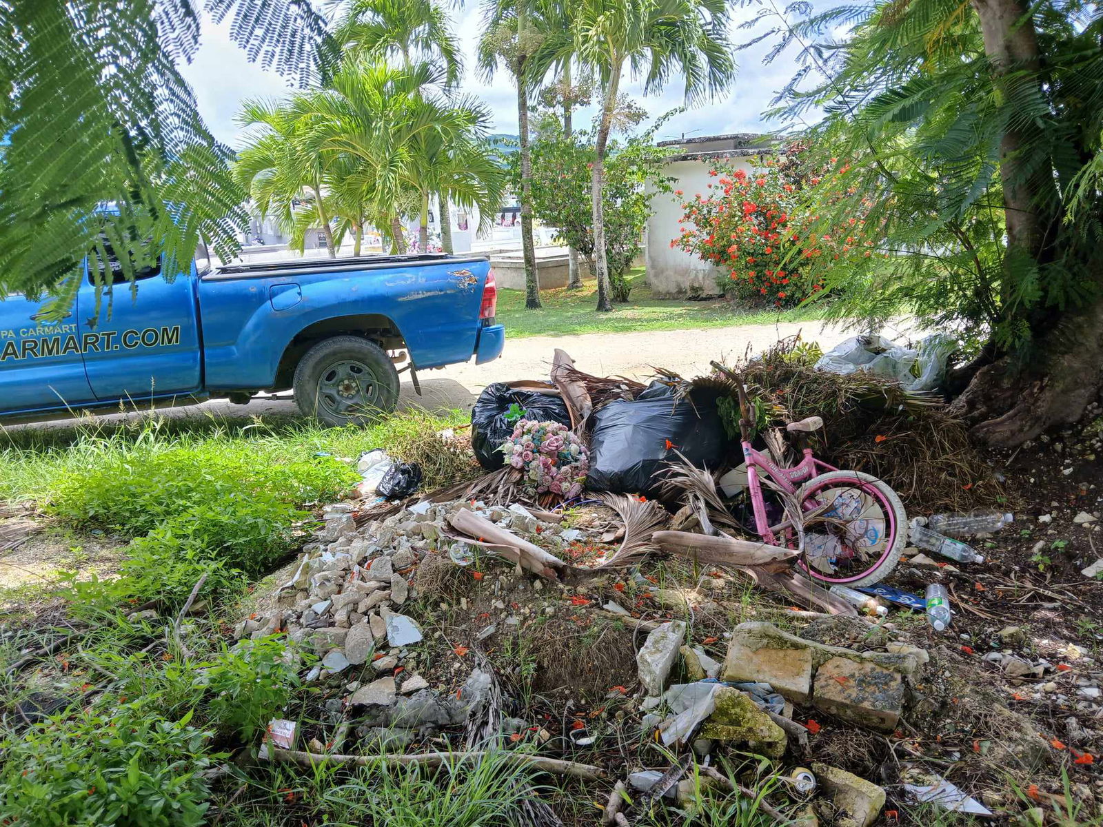 Household trash dumped on private property near the Chalan Kanoa cemetery.