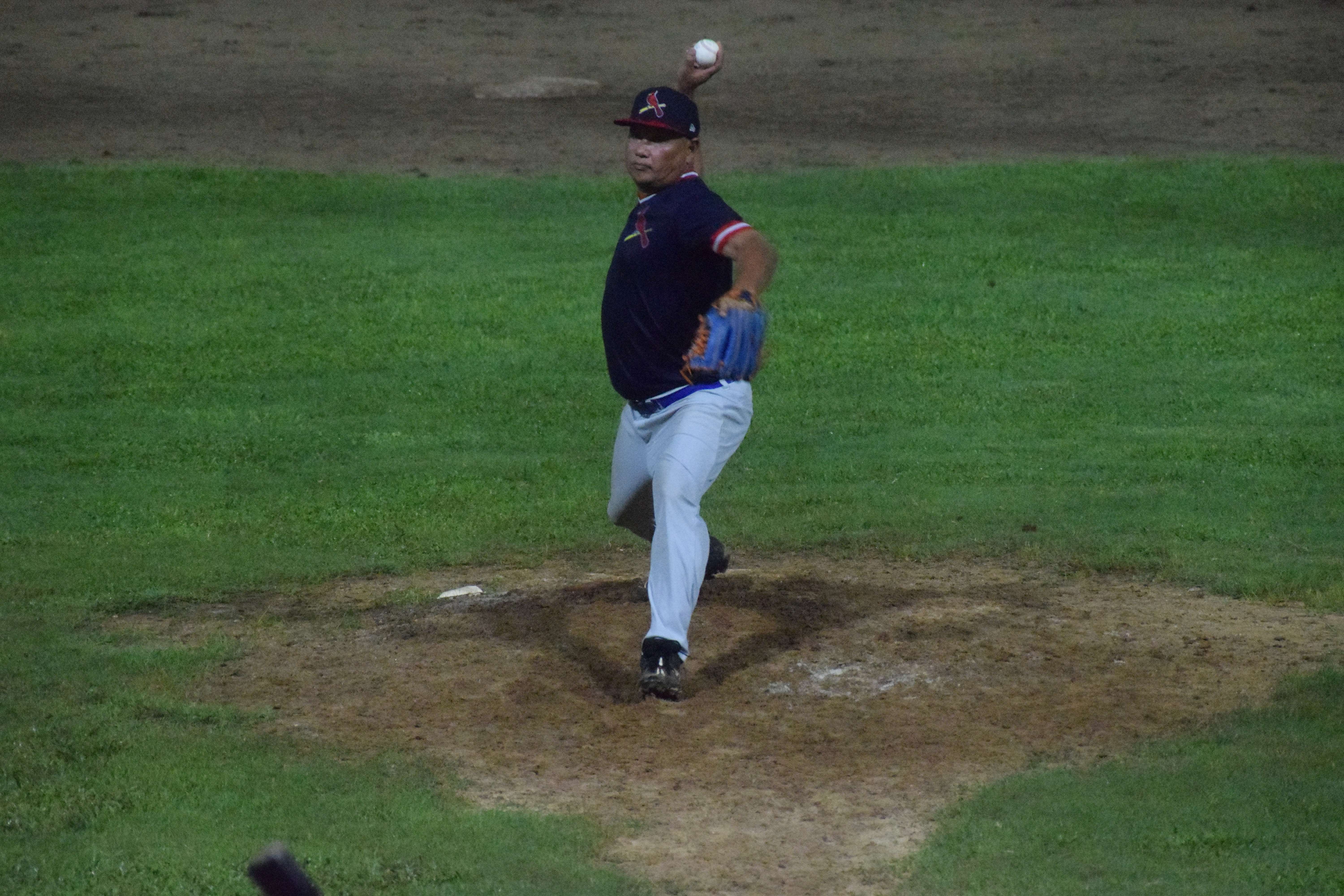 Cardinals pitcher Bill Camacho throws the ball at a Padres batter during the first game of the 2024 Tan Holding Saipan Baseball League best-of-three finals at the Francisco “Tan Ko” Palacios Baseball Field on Wednesday night.