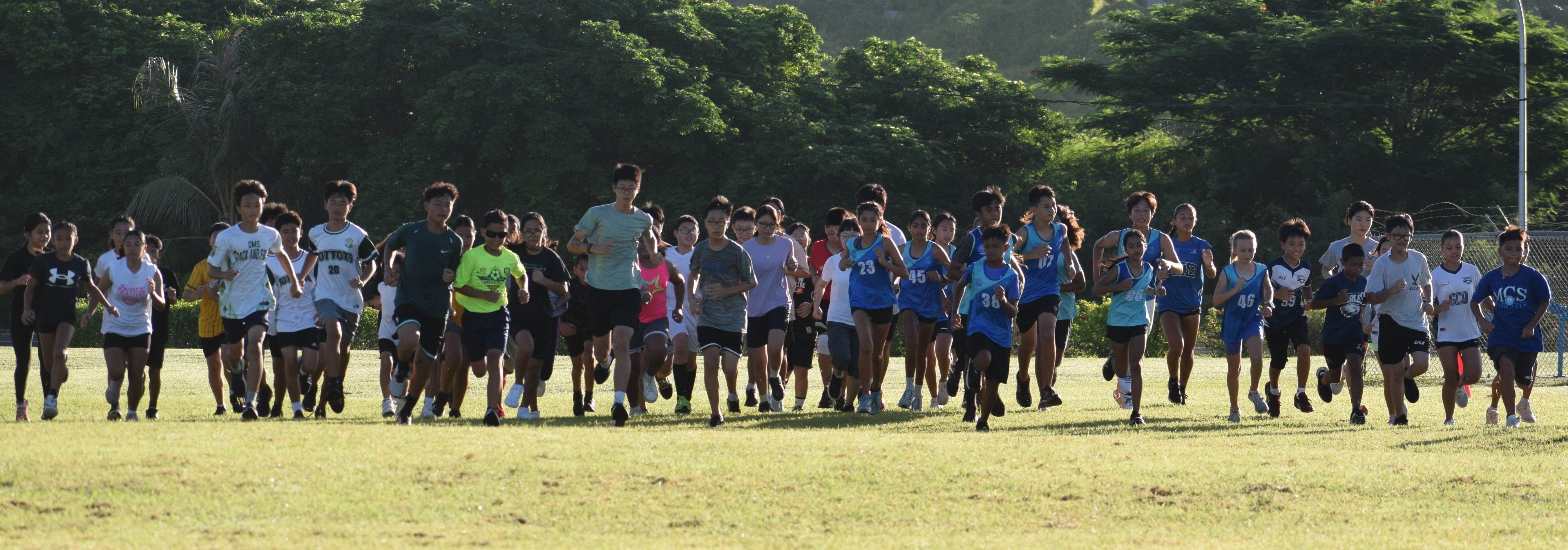 Middle school students take off for a two-mile run during the Public School System’s Cross Country event at airport field on Saturday.