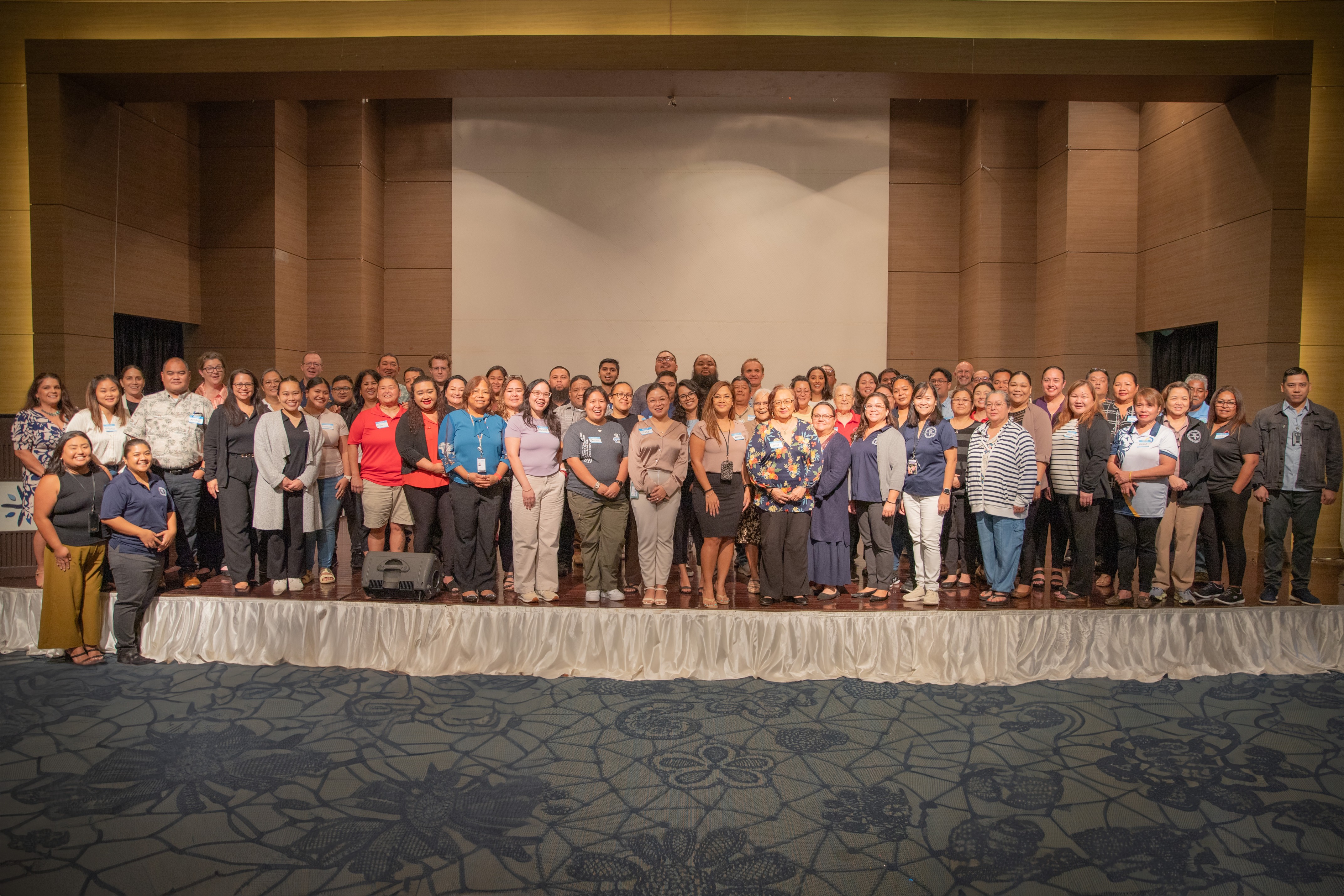 Participants of a community stakeholder meeting hosted by the Commonwealth Healthcare Corporation’s Public Health Services pose for a photo at the World Resort Taga Hall on Sept. 10, 2024.