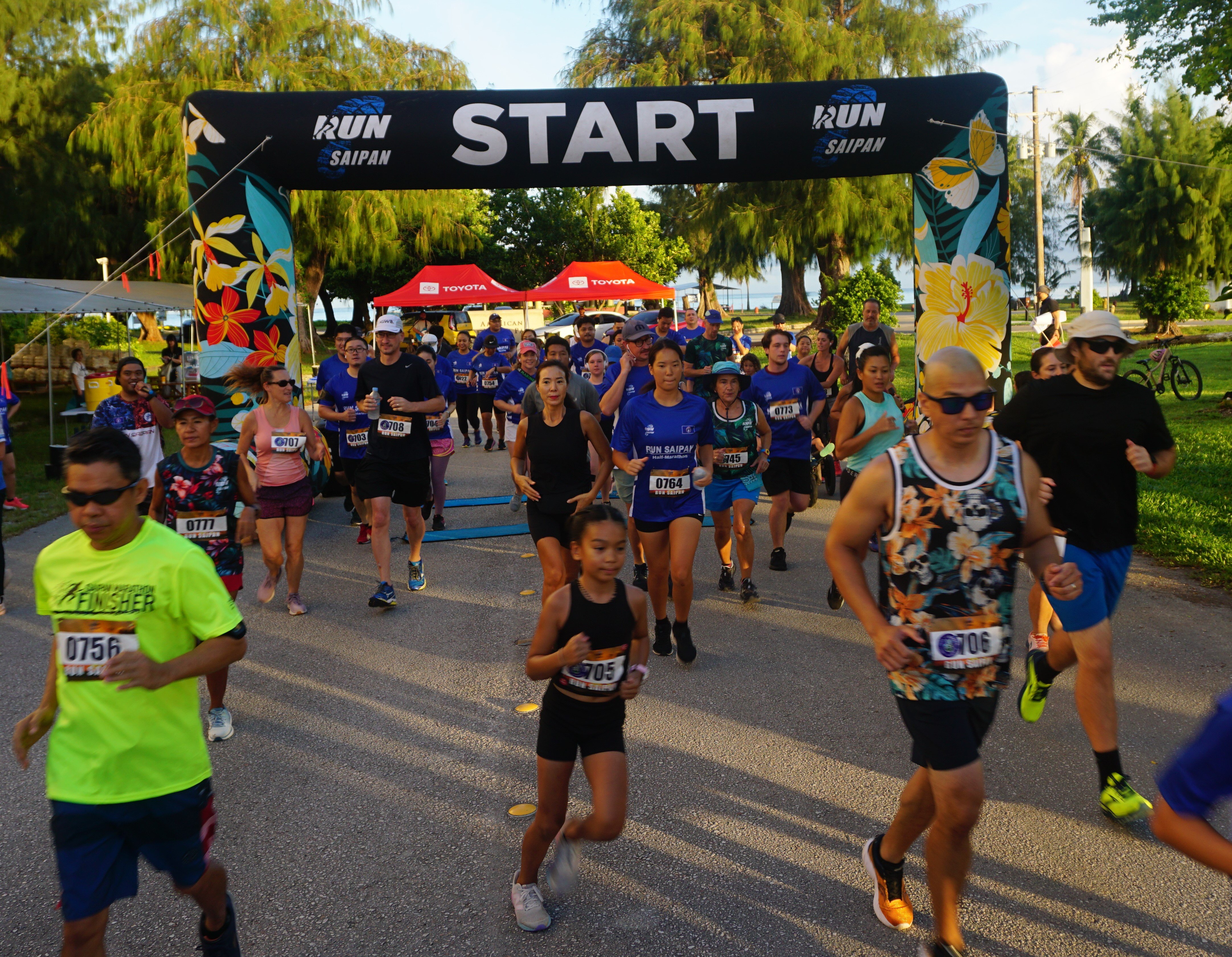 Participants take off from the starting point of the Run Saipan Labor Day Half Marathon 2024 at American Memorial Park on Saturday morning. 