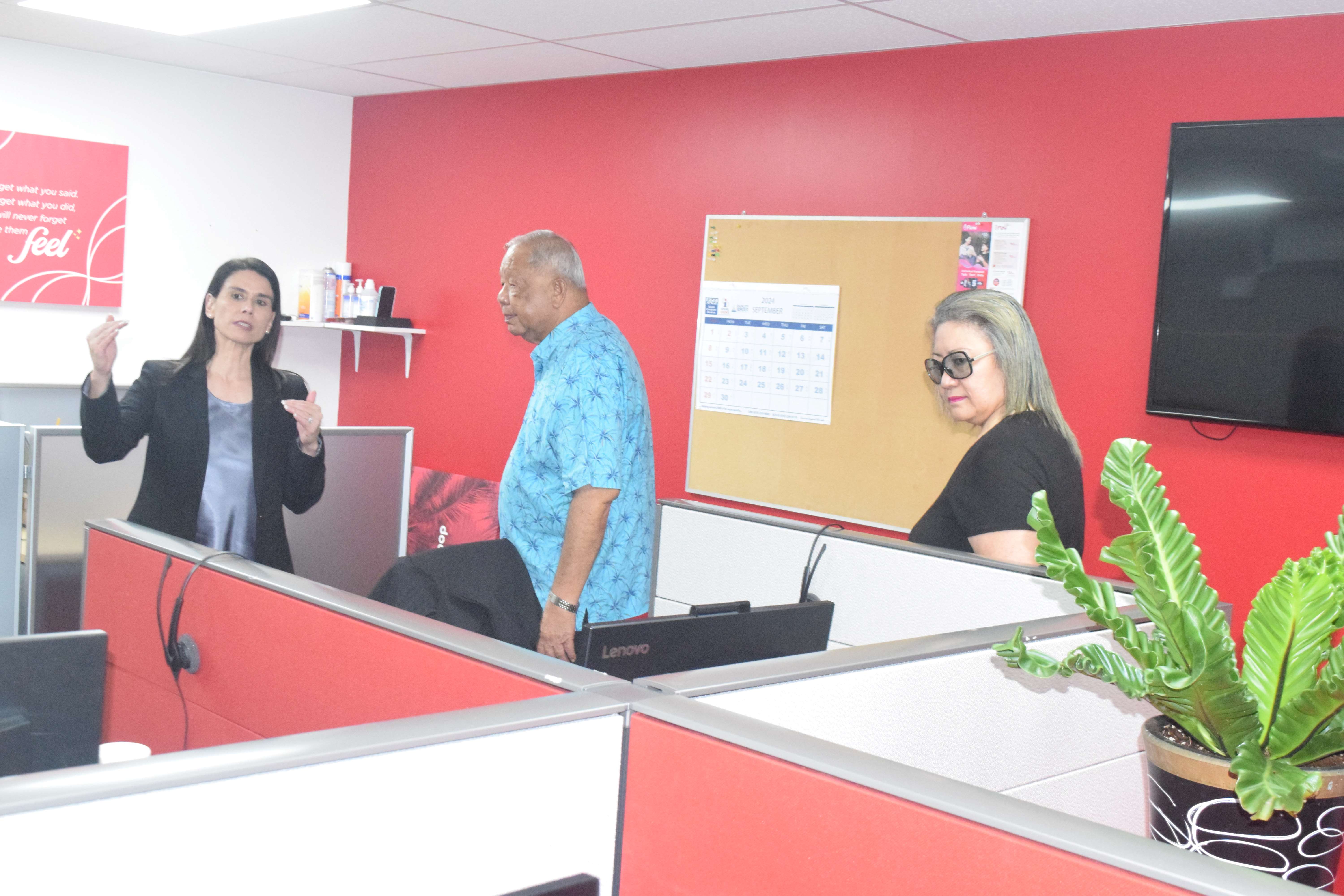 Docomo Pacific President and Chief Executive Officer Christine Baleto with Lt. Gov. David M. Apatang and Senate President Edith Deleon Guerreo at Docomo Pacific’s new call center in Gualo Rai.