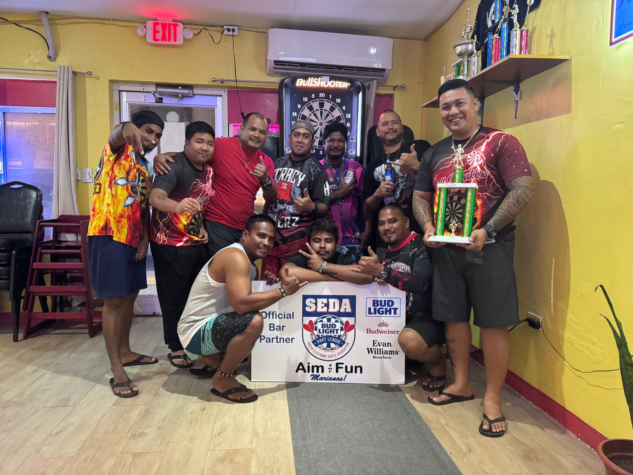 The Black 8 Bull Breakers and Tambayan GVD Mixed pose for a group photo after their match in the A Division of the 2024 SEDA Bud Light Dart League at the Tambayan Resto-Bar & Grill on Monday night.