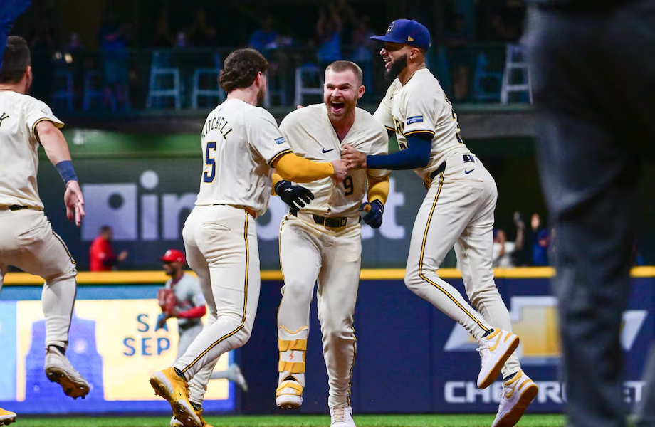 Milwaukee Brewers designated hitter Jake Bauers (9) celebrates with teammates after his game-winning hit beat the Philadelphia Phillies at American Family Field in Milwaukee, Wisconsin, Sept. 18, 2024.